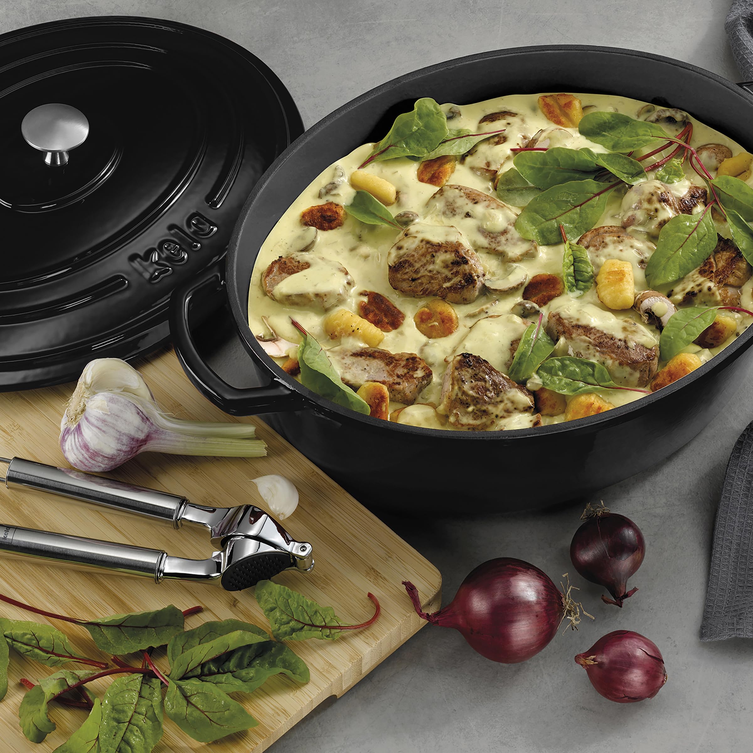 Kela Calido 9.5L Cast Iron Oval Casserole Dish - Black Enamel Dutch Oven for Baking, Roasting & Serving - Perfect for Oven, Stovetop & Camping Cooking