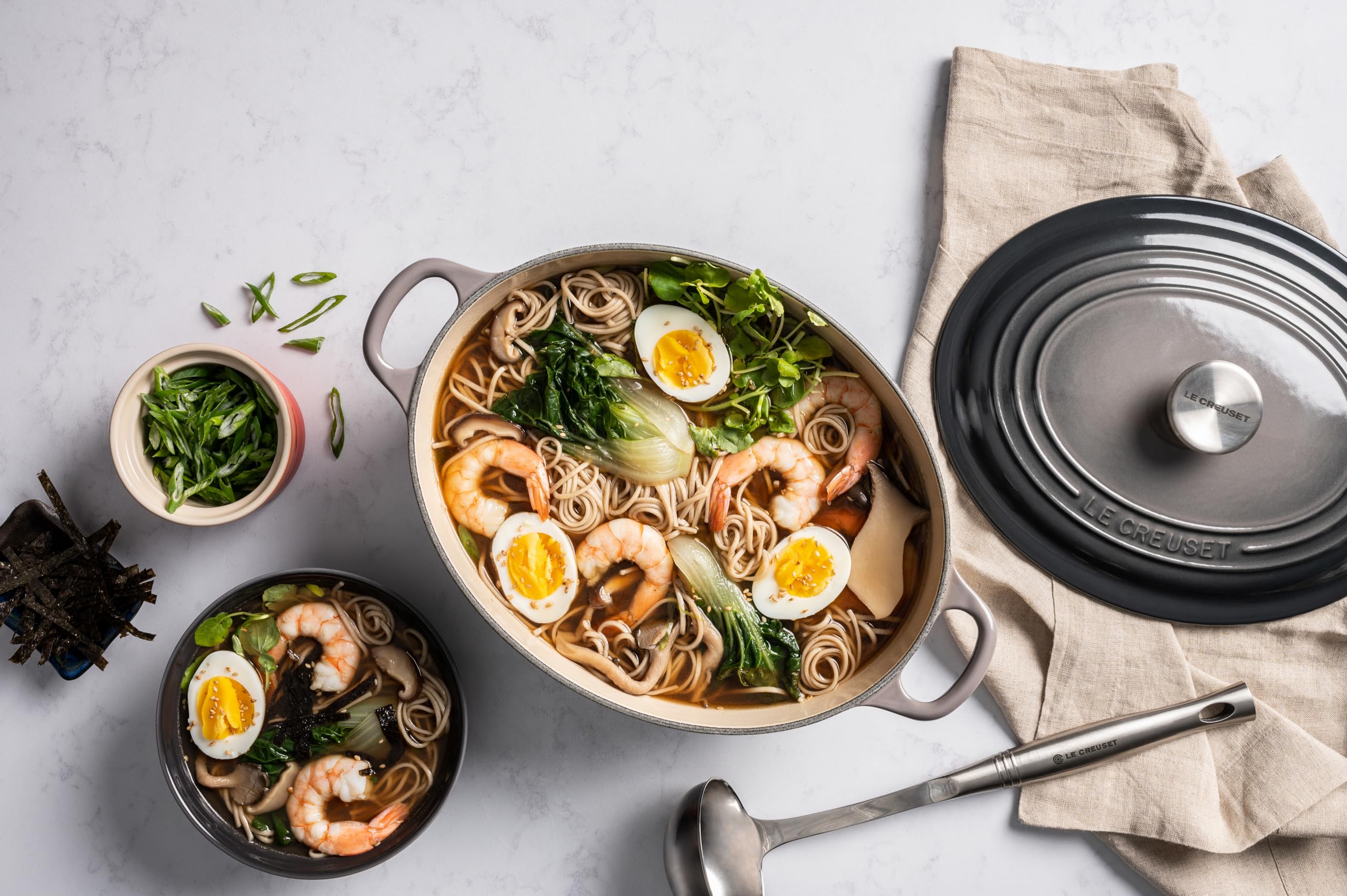 Le Creuset Signature Enameled Cast Iron Oval Dutch Oven 6.75 Quart - Oyster Color | Premium Kitchen Cookware for Braising, Stewing & Baking | Perfect for Family Dinners & Holiday Meals