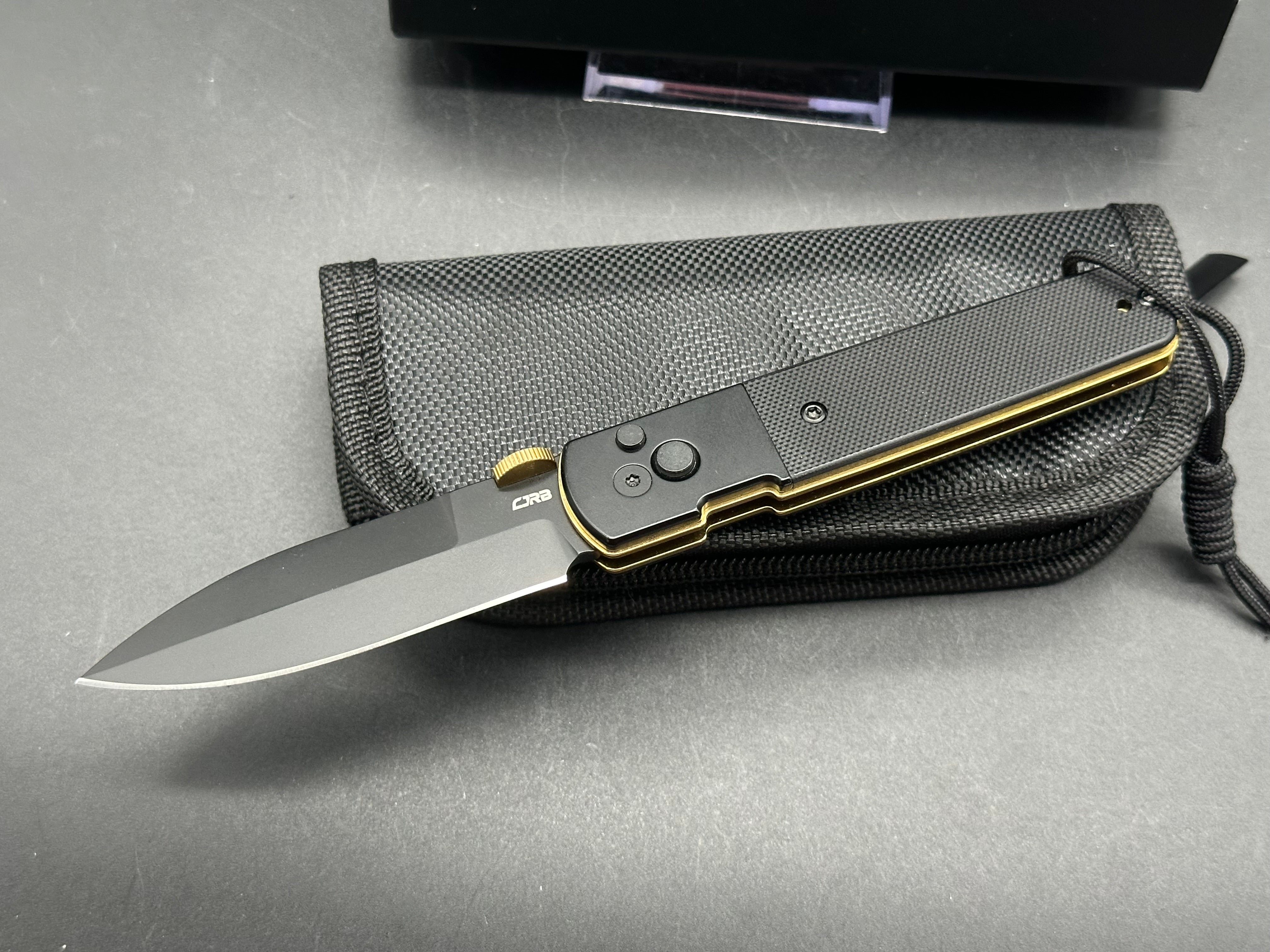 CJRB LOCUST Folding Knife - Black PVD Coated AR-RPM9 Steel Blade, G10 Handle, Spear Point Design for Outdoor, Camping & EDC Use
