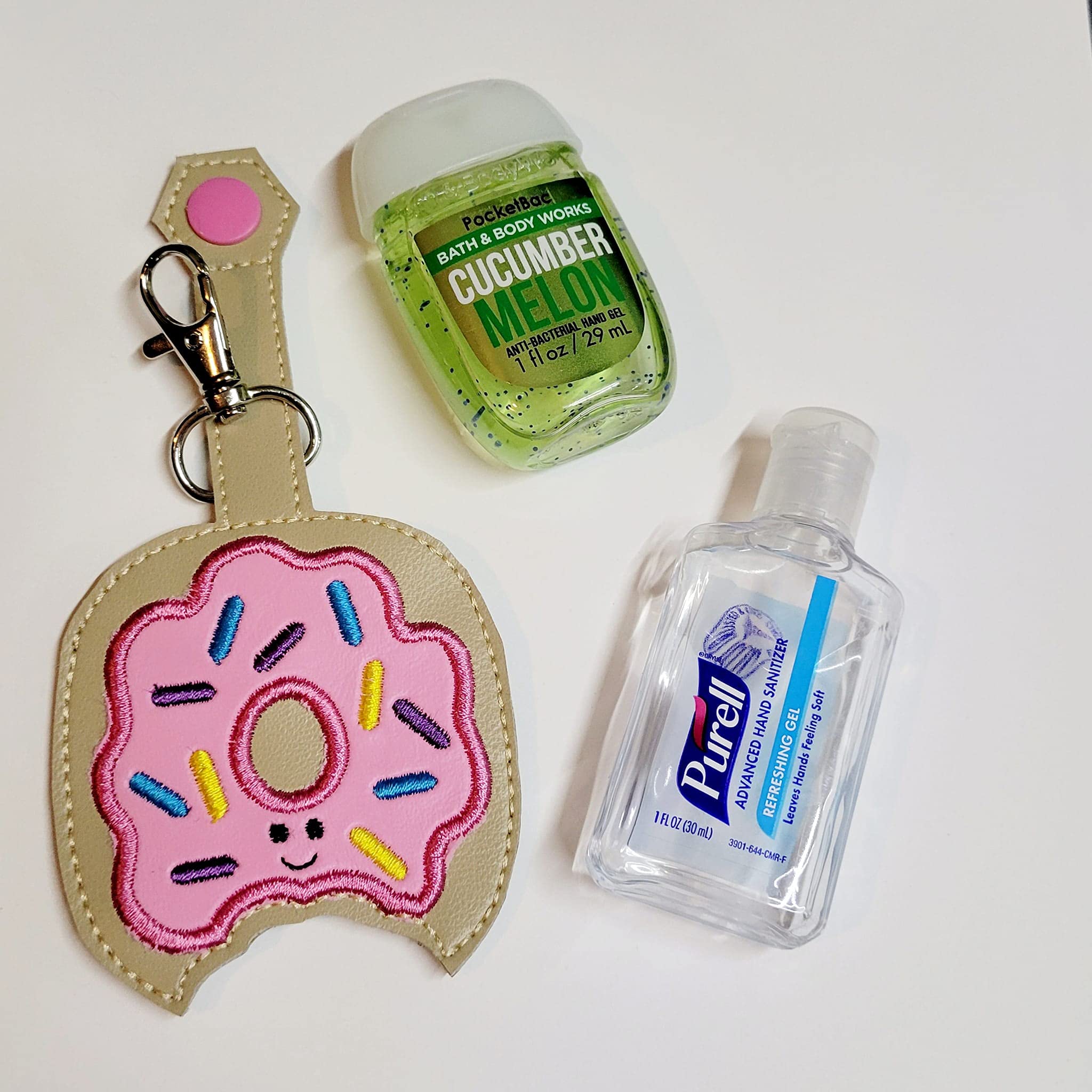 Donut-Shaped Hand Sanitizer & Lip Balm Holder Keychain - Cute Sanitizing Accessory for Purse, Backpack or Car Keys - Perfect for Travel, Office and Daily Use