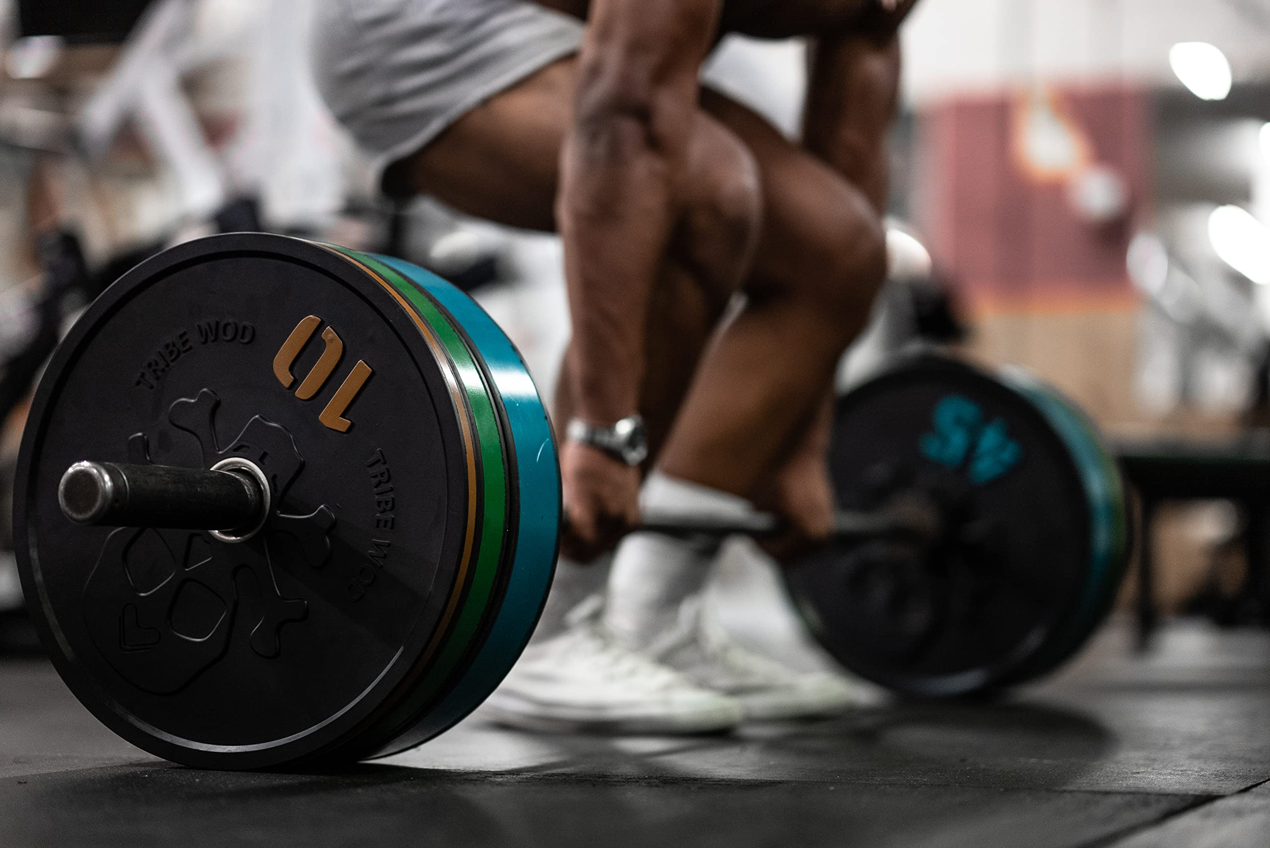 Tribe WOD Bumper Plates - Premium Rubber & Steel Olympic Weight Plates for CrossFit, Powerlifting & Home Gym - Compatible with Rep Fitness & Most Olympic Bars - Perfect for Strength Training & Functional Fitness Workouts