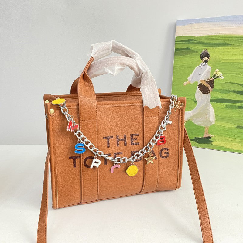 Stylish Letter Chain Tote Bag for Women - Trendy Canvas Shoulder Bag with Metal Chain Strap - Perfect for Shopping, Beach, Work & Daily Use
