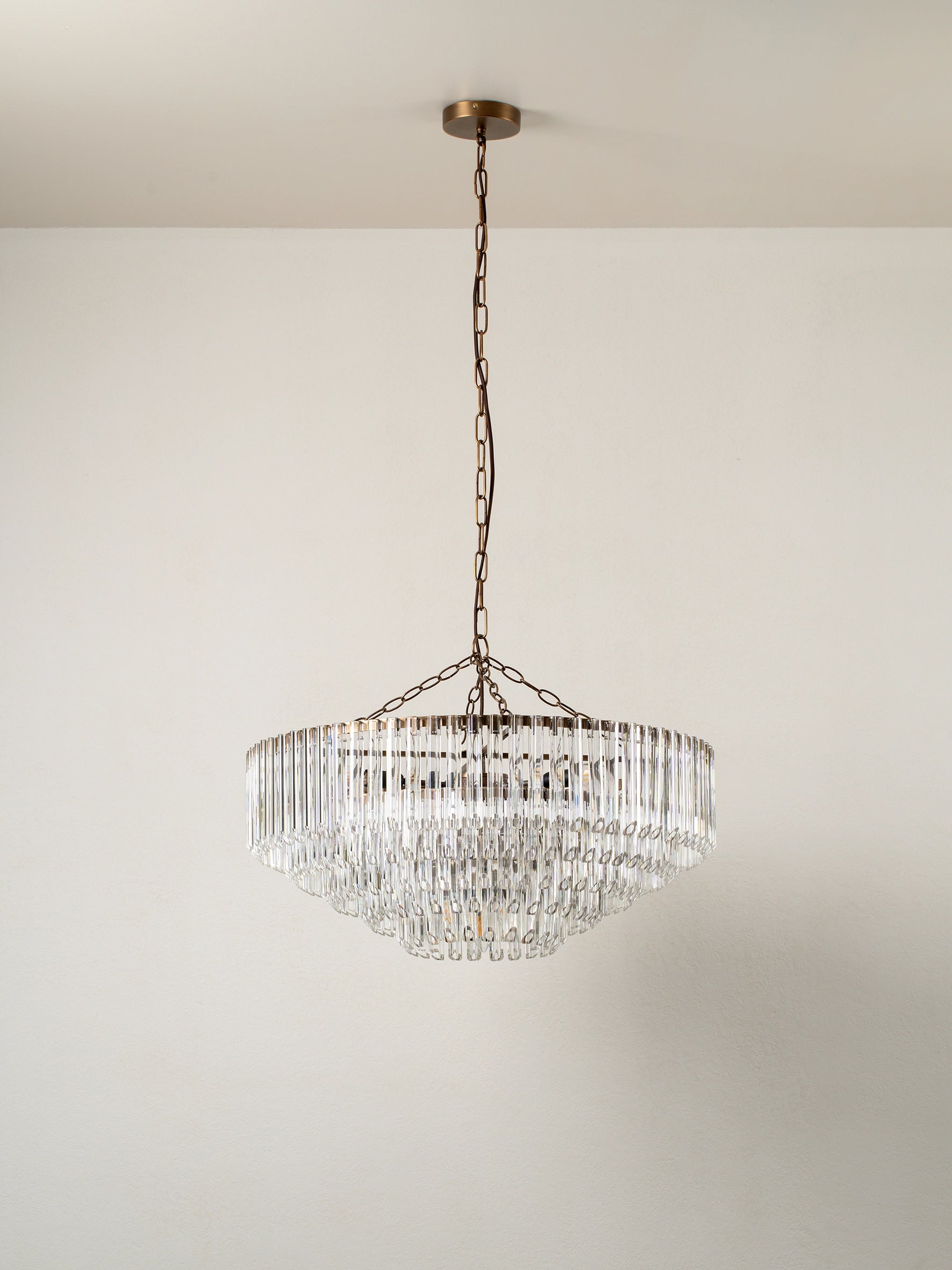 Petalia 9-Light Aged Brass and Clear Glass Tube Wide Chandelier - Elegant Dining Room Lighting for Farmhouse & Modern Decor