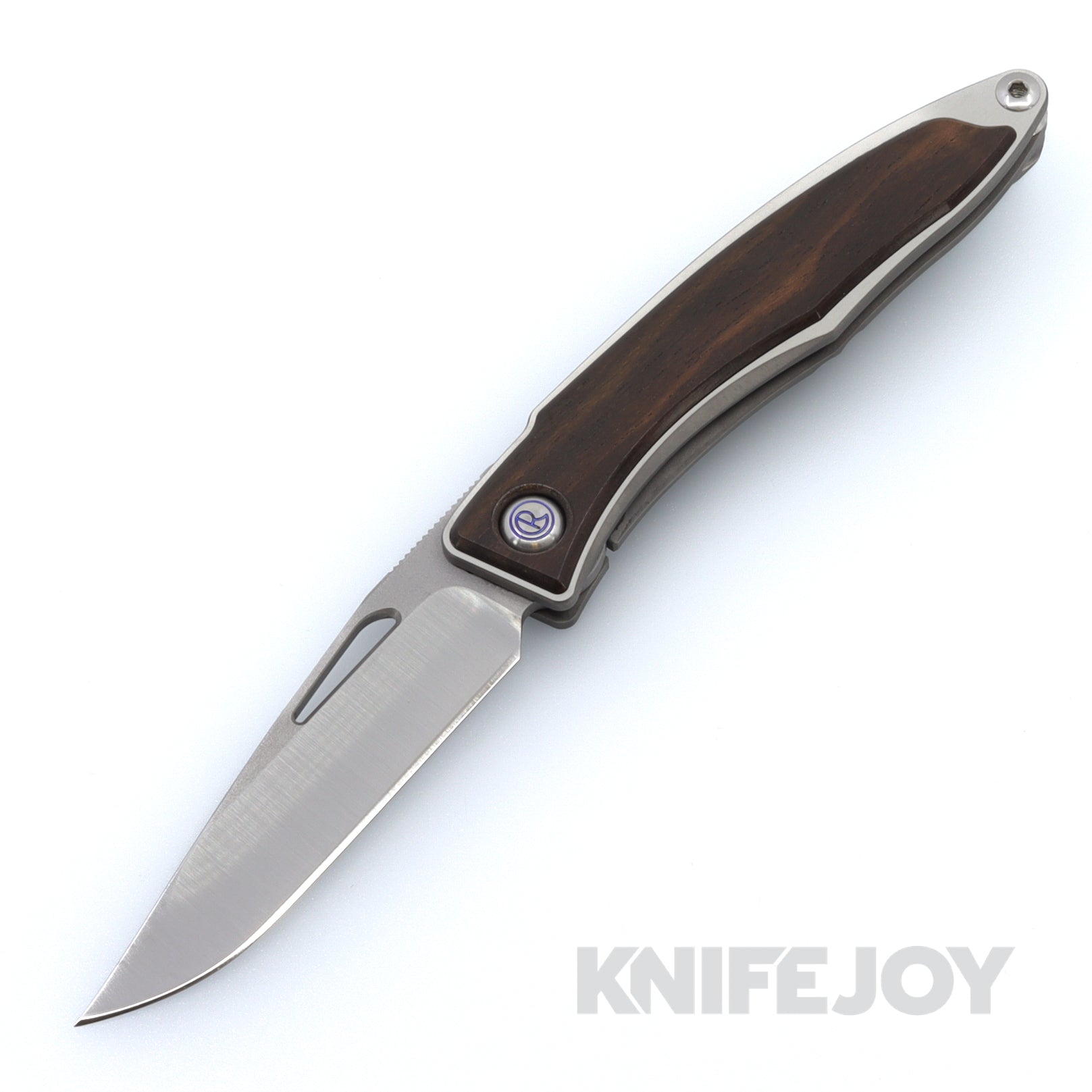 Chris Reeve Knives Mnandi Folding Knife - Magnacut Clip Point Blade, Titanium Handles with Macassar Ebony Inlay - Perfect for EDC, Outdoor Adventures & Collectors
