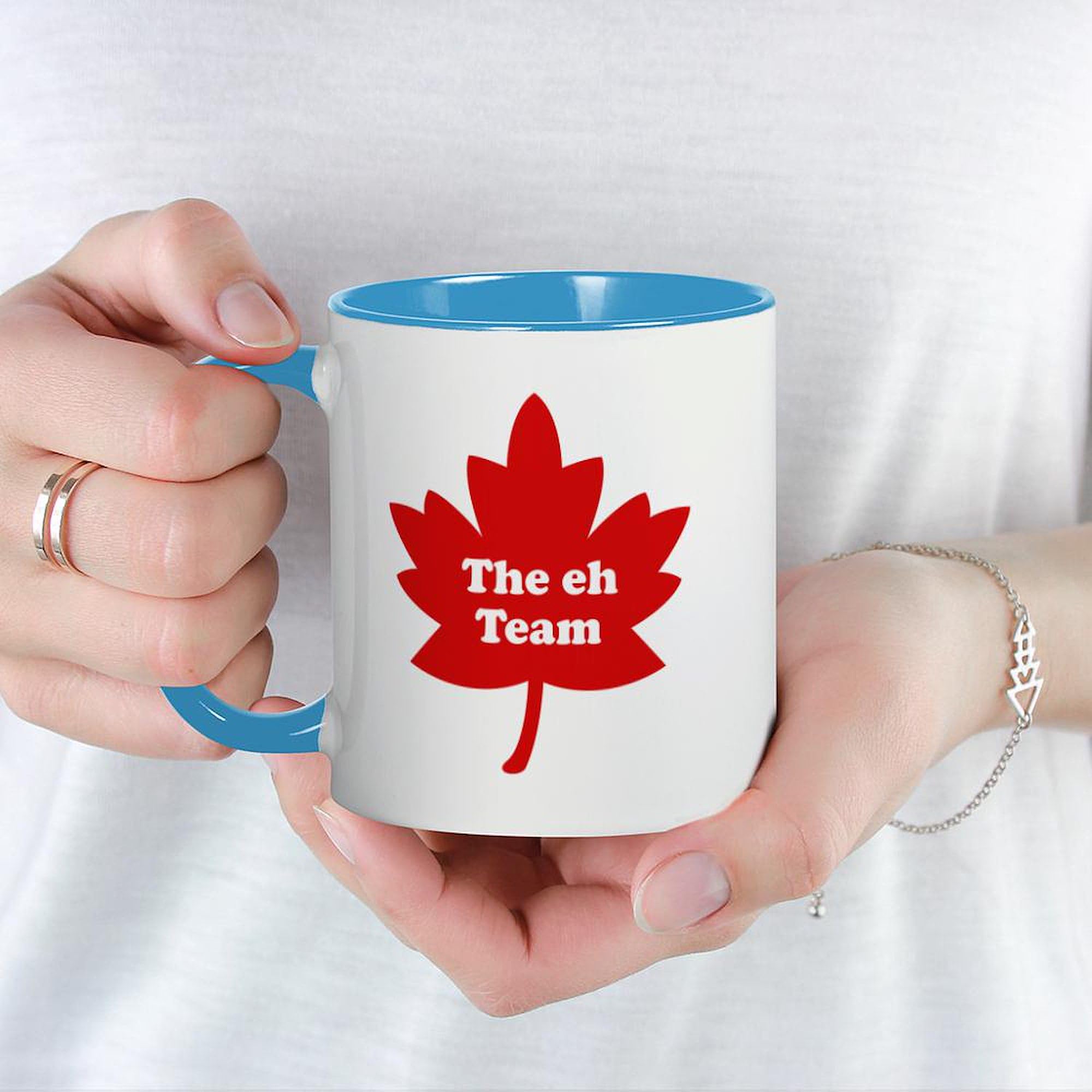 The Eh Team Mug - 11 oz (325 ml) Ceramic Coffee Cup for Tea & Hot Drinks - Funny Canadian Gift for Office, Home & Camping Use