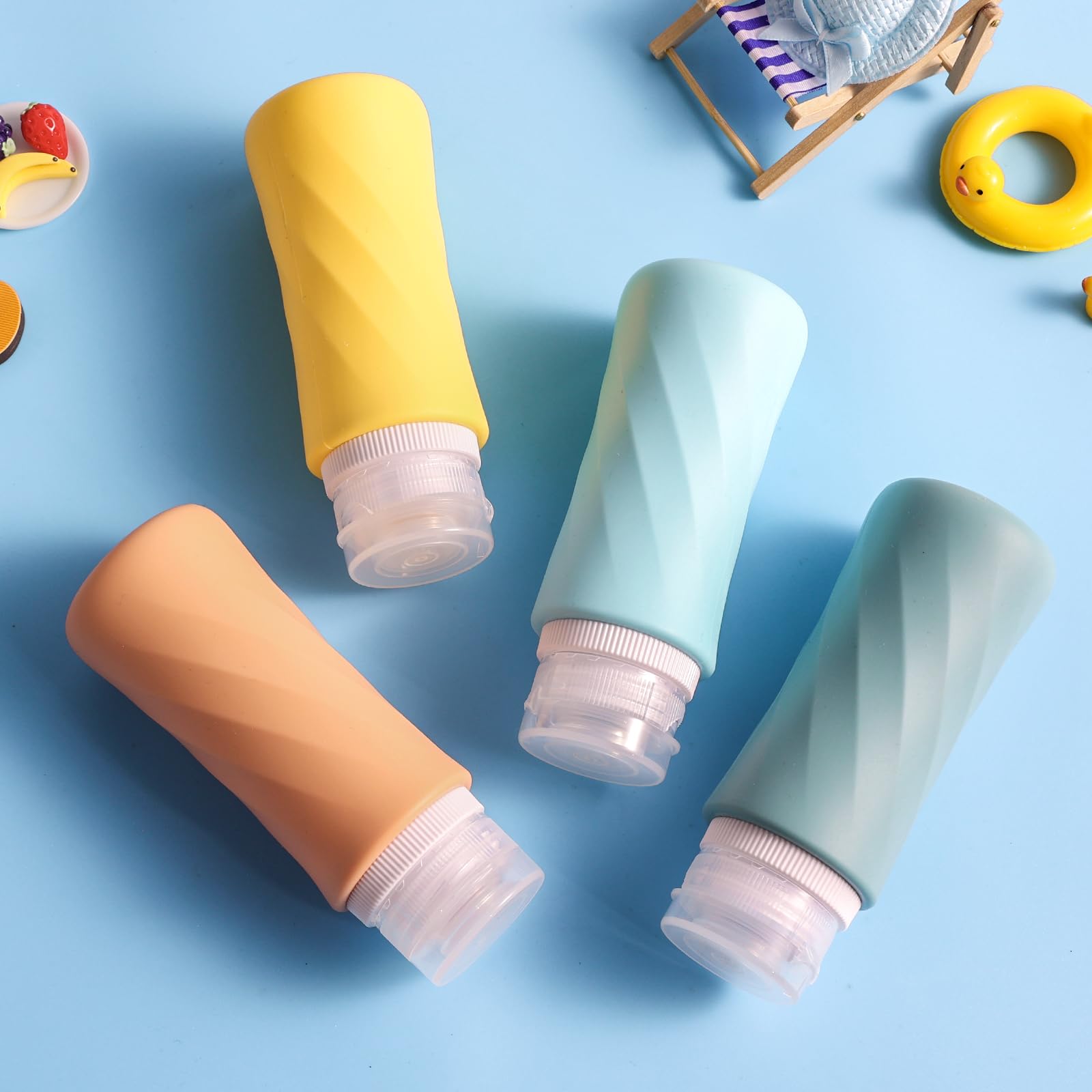 TSA Approved 3.3oz Travel Bottles for Toiletries - 4 Pack Leak Proof Squeezable Silicone Containers with Clear Toiletry Bag | BPA Free, Portable & Reusable | Perfect for Air Travel, Gym, Camping & Vacation Essentials