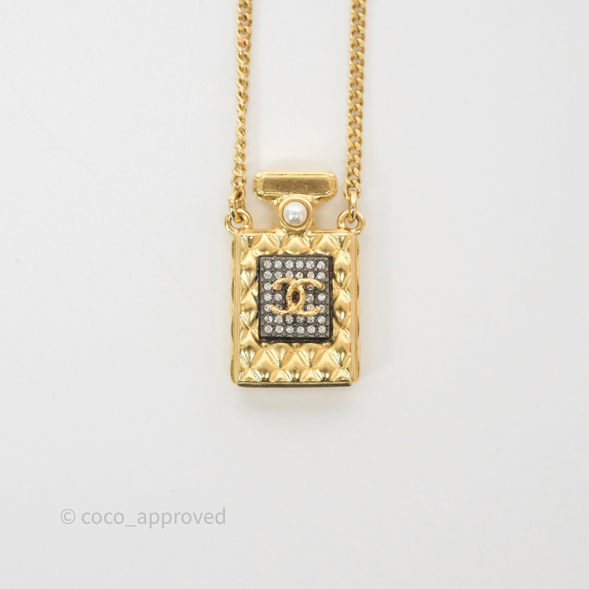 Chanel CC Perfume Bottle Rhinestone Necklace - Gold Tone 21V Pendant for Women | Elegant Fashion Jewelry Gift for Birthday, Anniversary & Special Occasions