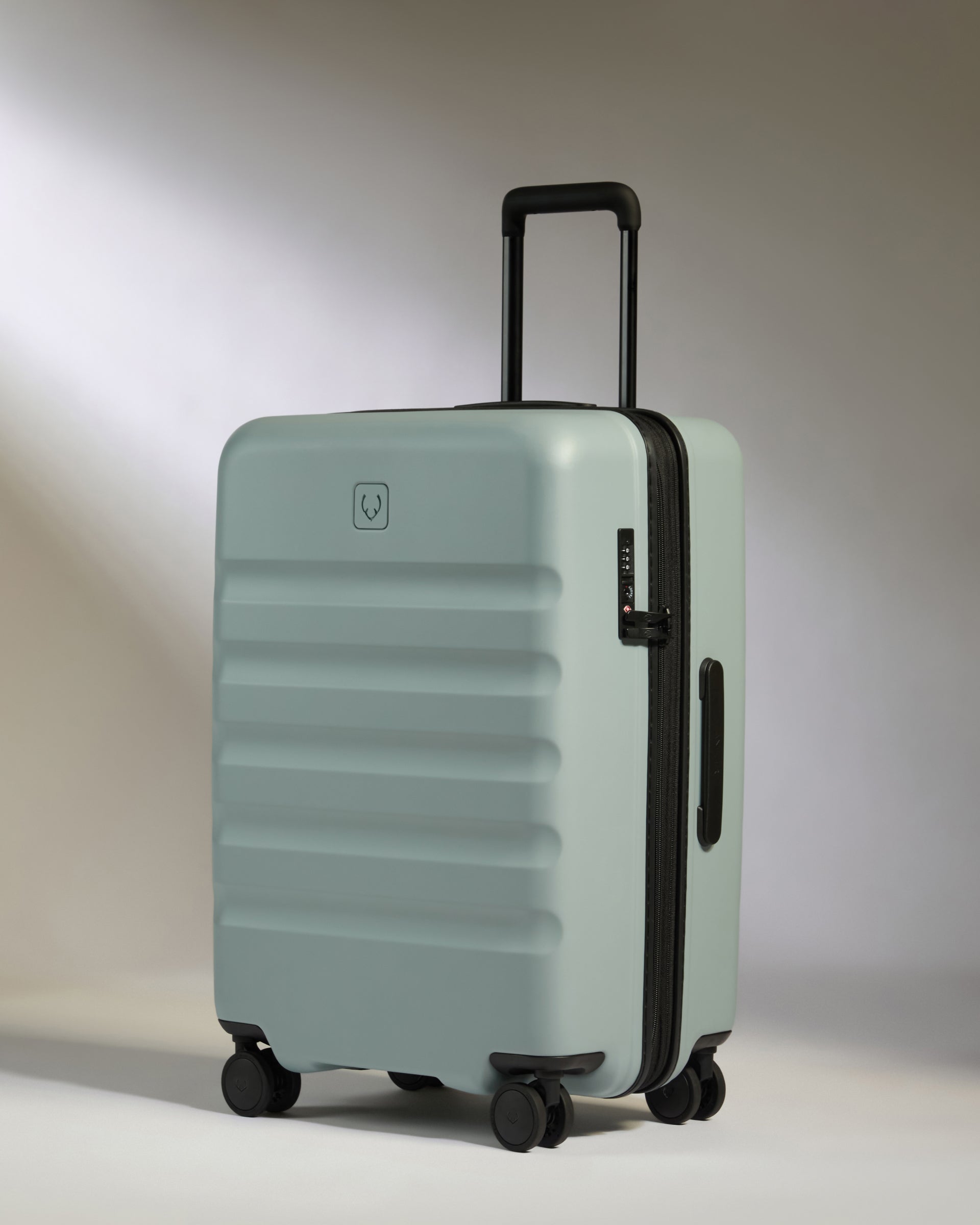 Mist Blue Medium Luggage with Icon Stripe - Lightweight Carry-On Suitcase for Travel, Business Trips & Weekend Getaways