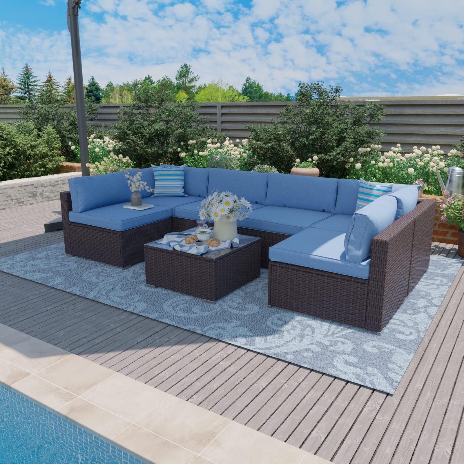 **7-Piece SUNBURY Outdoor Sectional Sofa Set - Espresso Brown Wicker Patio Furniture with 2 Stripe Pillows, Denim Blue Cushions & Tempered Glass Table - Weatherproof Cover Included - Perfect for Backyard, Garden, or Poolside Relaxation**
