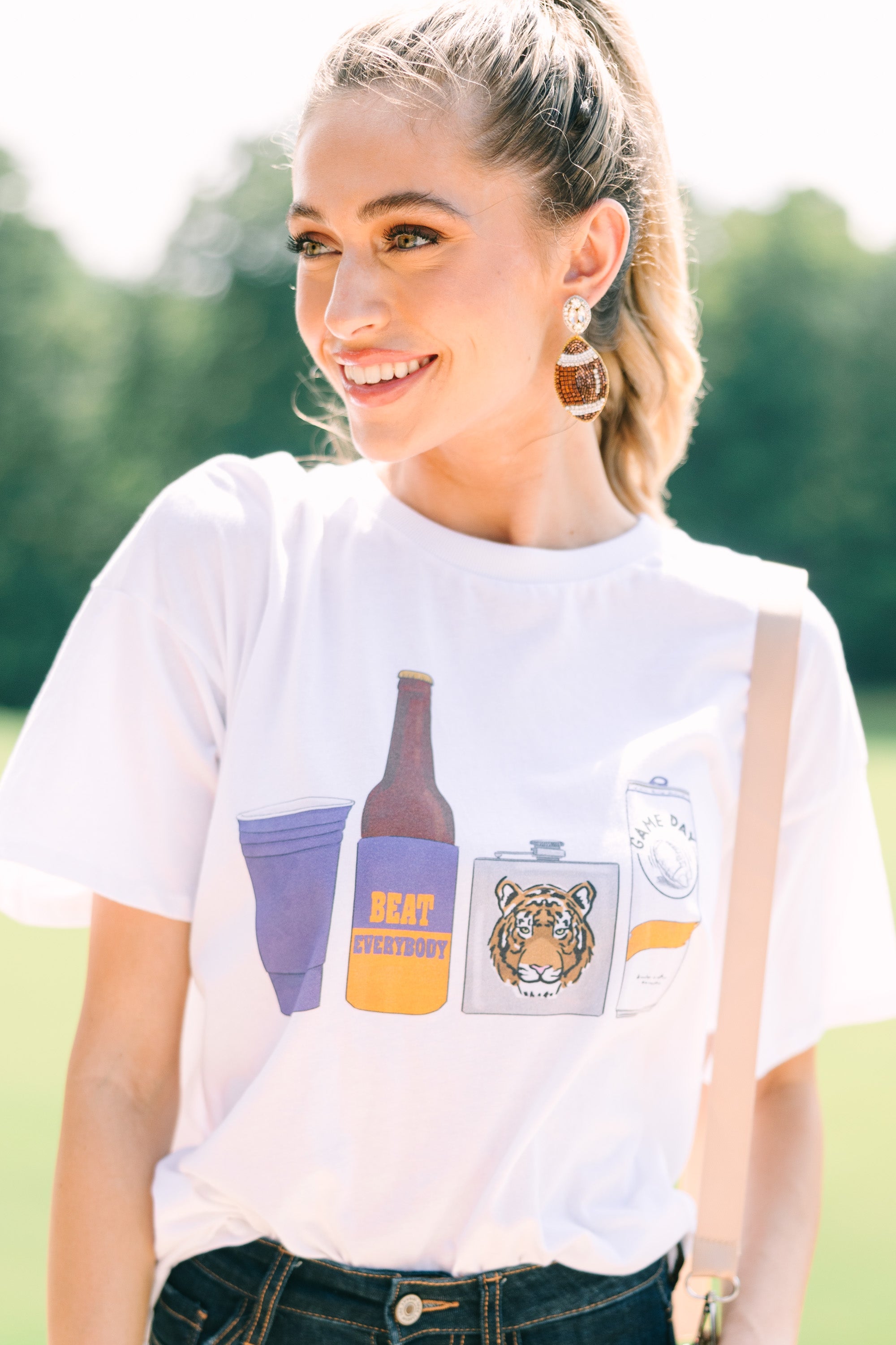 Drink Local Orange And Purple Gameday Graphic Tee - Vintage Style College Sports Fan T-Shirt for Football Tailgating & Game Day Parties