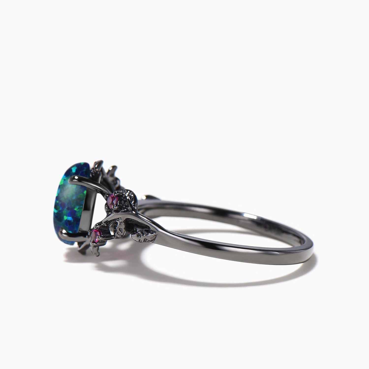 Oval Cut Black Opal Engagement Ring with Ruby Leaves in Black Gold - Nature Inspired Wedding Band for Women, Perfect for Proposals, Anniversaries & Romantic Occasions