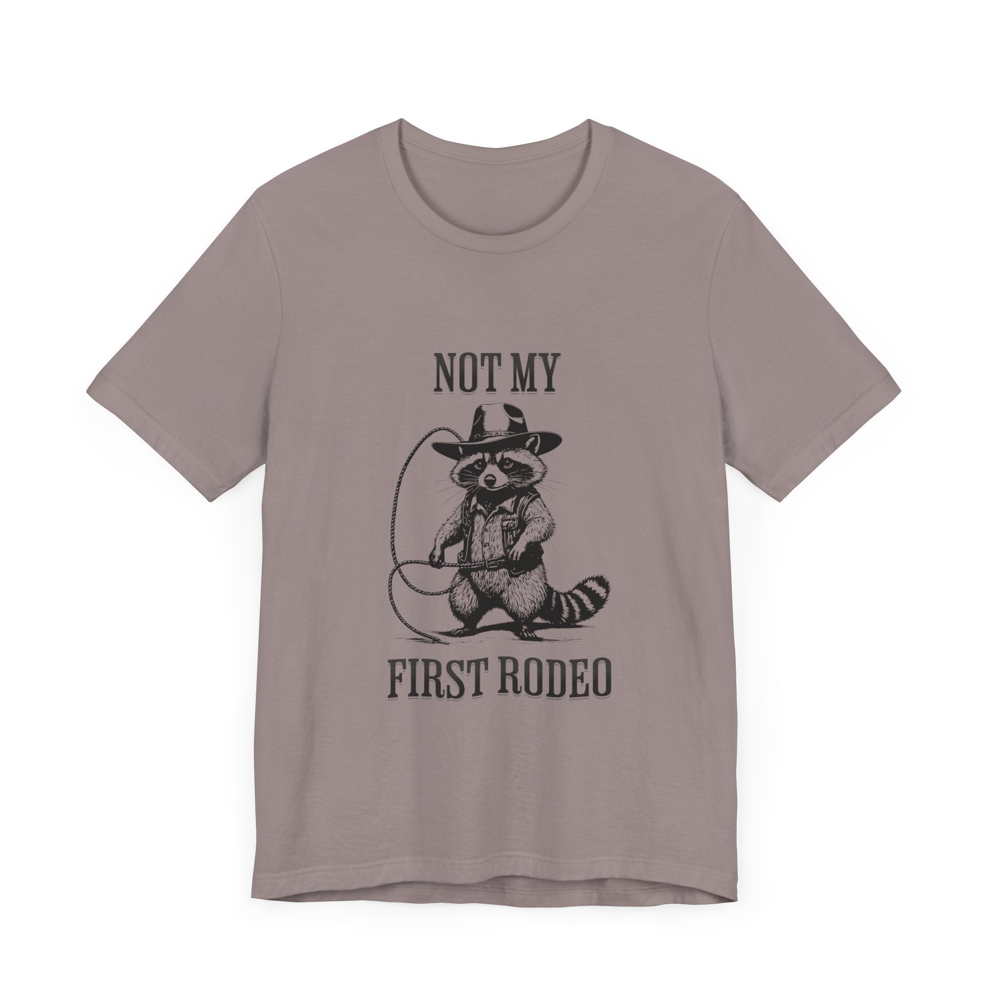 Funny Western Graphic Cotton Tee - Not My First Rodeo Cowboy Raccoon Shirt | Cute Quirky Country Style T-Shirt for Rodeo Fans & Animal Lovers | Perfect for Rodeo Events, Country Concerts & Casual Wear