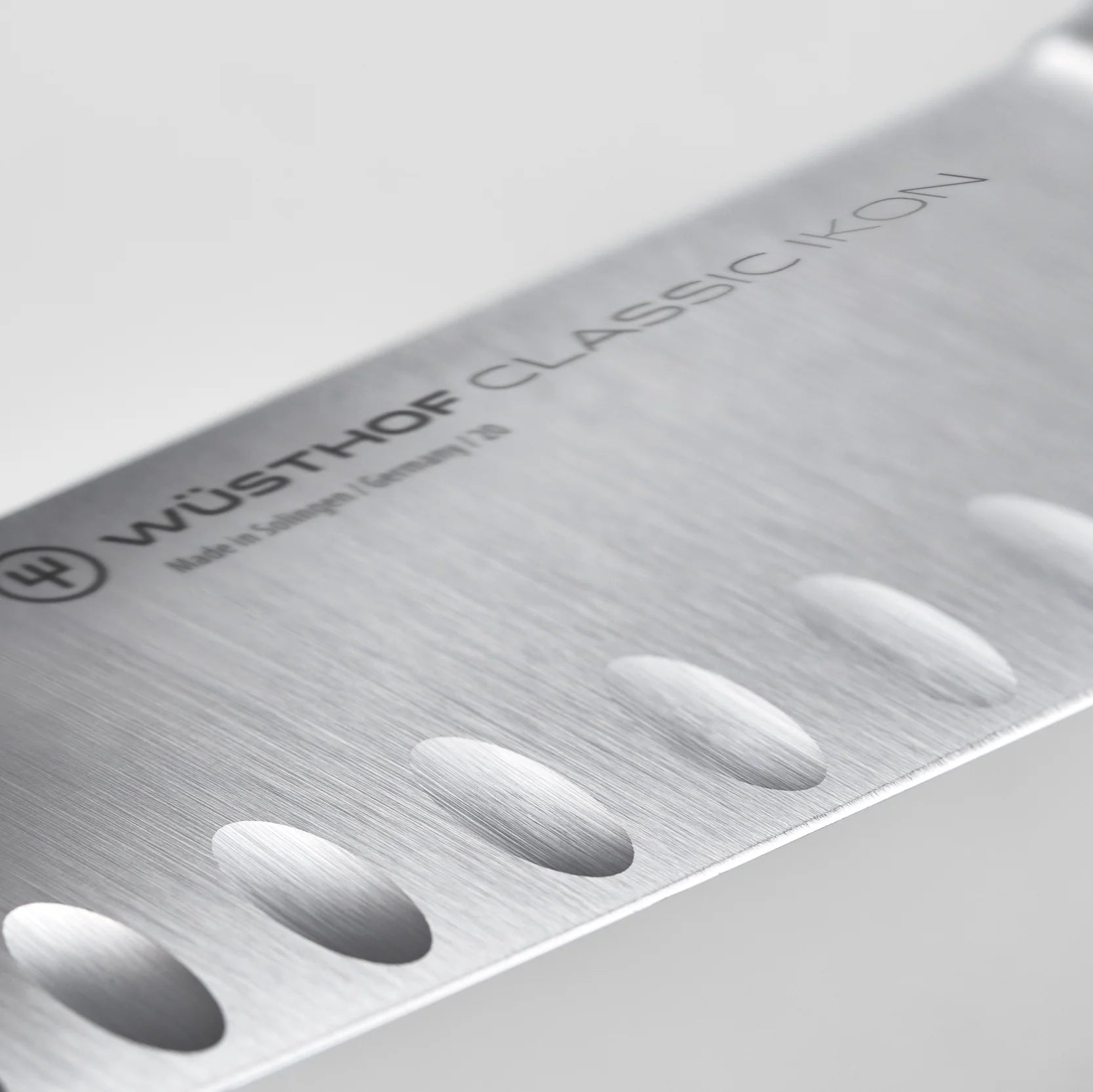 Wusthof Classic 7-Inch Ikon Hollow Edge Santoku Knife - Premium German Kitchen Knife for Precise Slicing, Dicing & Chopping - Perfect for Home Chefs & Professional Cooking