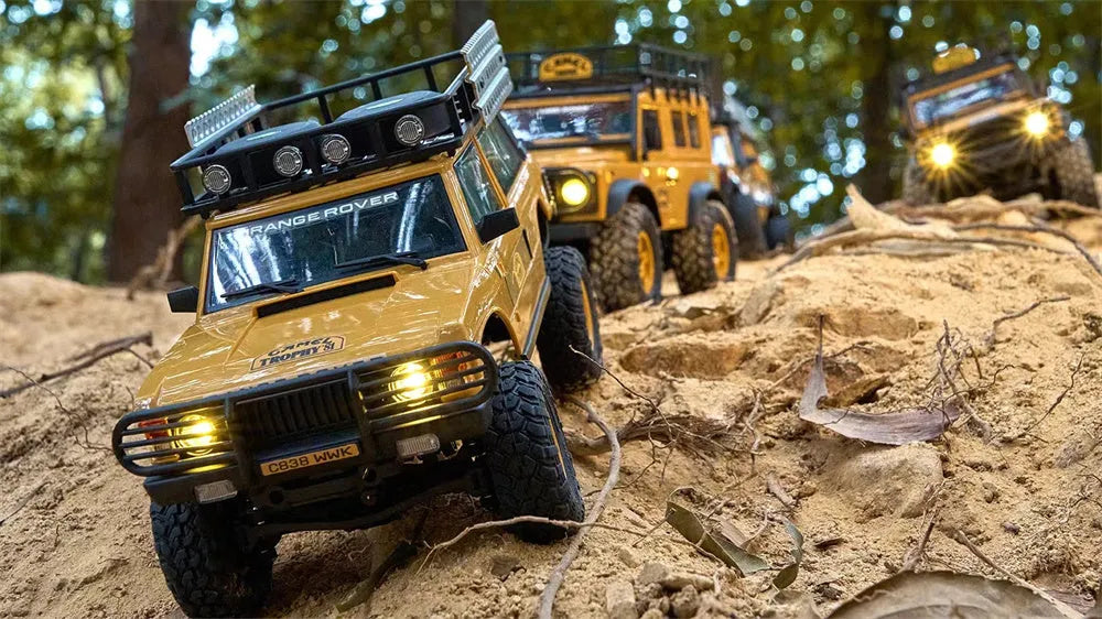 FMS FCX24M 1/24 Scale 4WD RC Rock Crawler Truck - Licensed Range Rover Camel Trophy Edition with LED Lights | 2.4G Remote Control Off-Road Vehicle for Indoor/Outdoor Crawling & Trail Adventures
