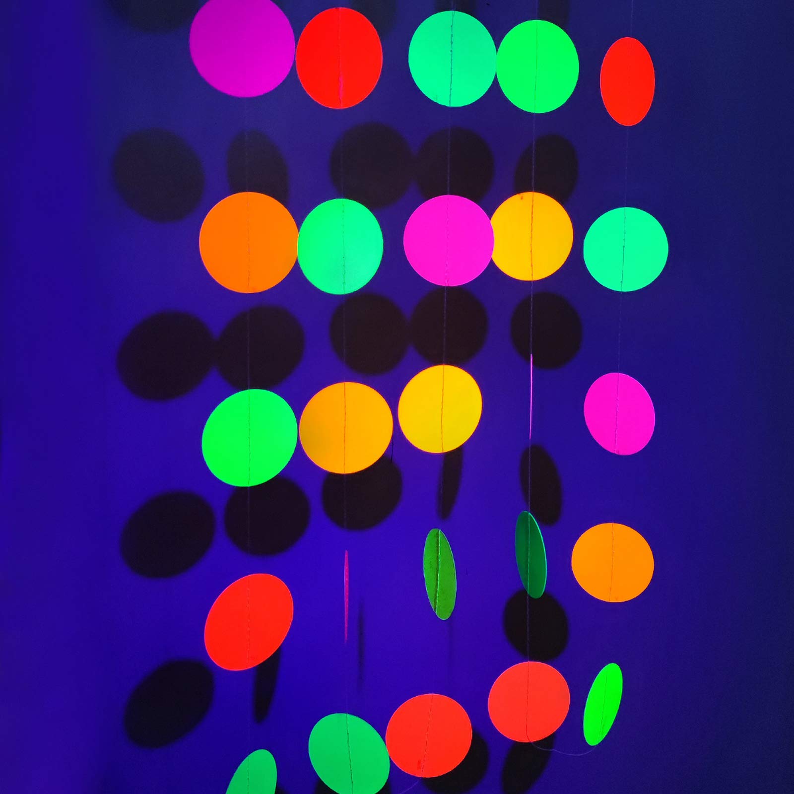 UNIIDECO Neon Paper Circles Garland - Glow in The Dark Party Decorations, UV Blacklight Reactive Hanging Streamers for Rave, Birthday & Room Decor - Perfect for Wall Backdrops, Night Parties & Event Lighting