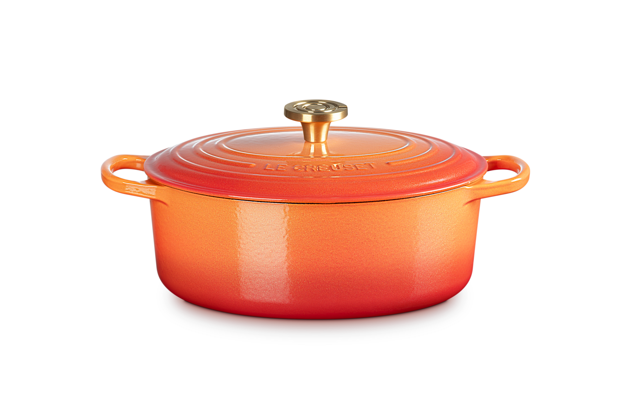 Le Creuset 4.7L Oval French Oven Dutch Oven - Flame Color (Flame Dorée) - Premium Cast Iron Cookware for Braising, Roasting & Baking - Perfect for Soups, Stews & Bread Making