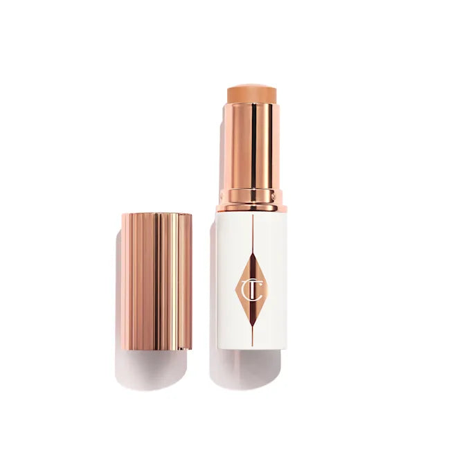 Charlotte Tilbury Unreal Skin Sheer Glow Tint Hydrating Foundation Stick - Medium 7, Lightweight Buildable Coverage for Flawless Natural Makeup - Perfect for Daily Wear & Special Occasions