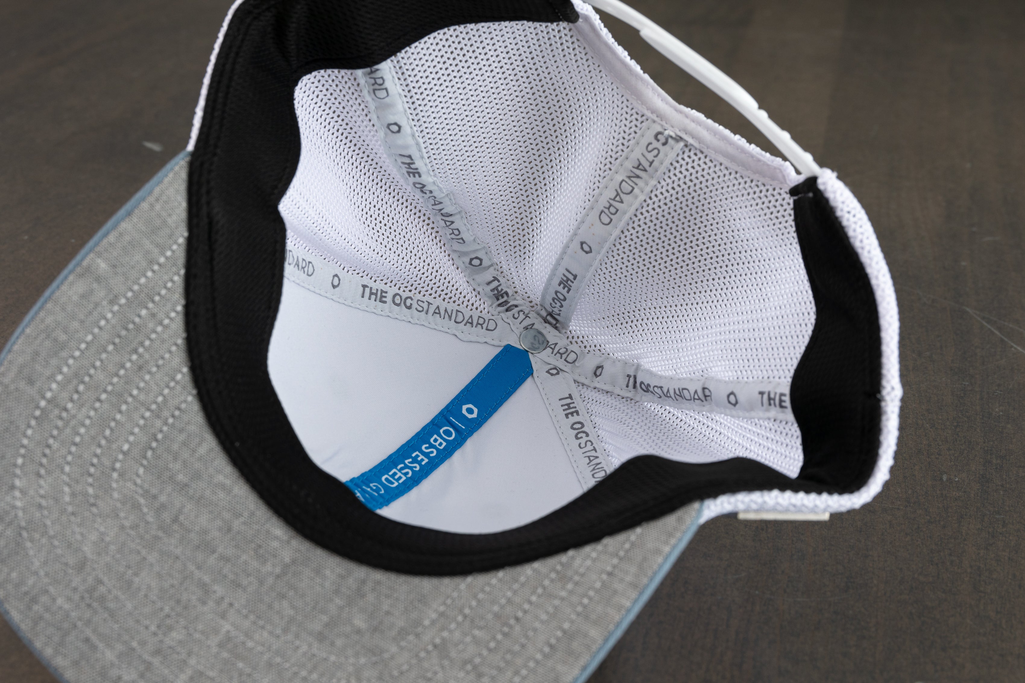 Obsessed Garage Label Hat - Premium Emira Giveaway Cap for Car Enthusiasts - Perfect for Racing Events & Casual Wear