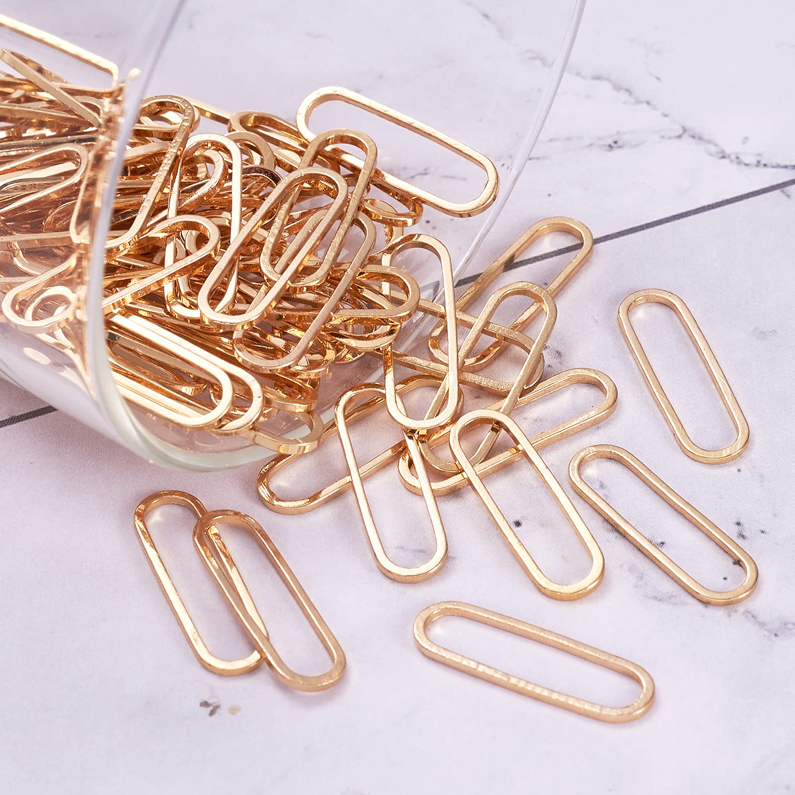 FASHEWELRY 100Pcs Brass Soldered Linking Rings - Hollow Geometric Oval Hanging Charms, 18K Gold Plated Connectors for Jewelry Making (20x6mm) - Perfect for Necklaces, Bracelets & DIY Craft Supplies