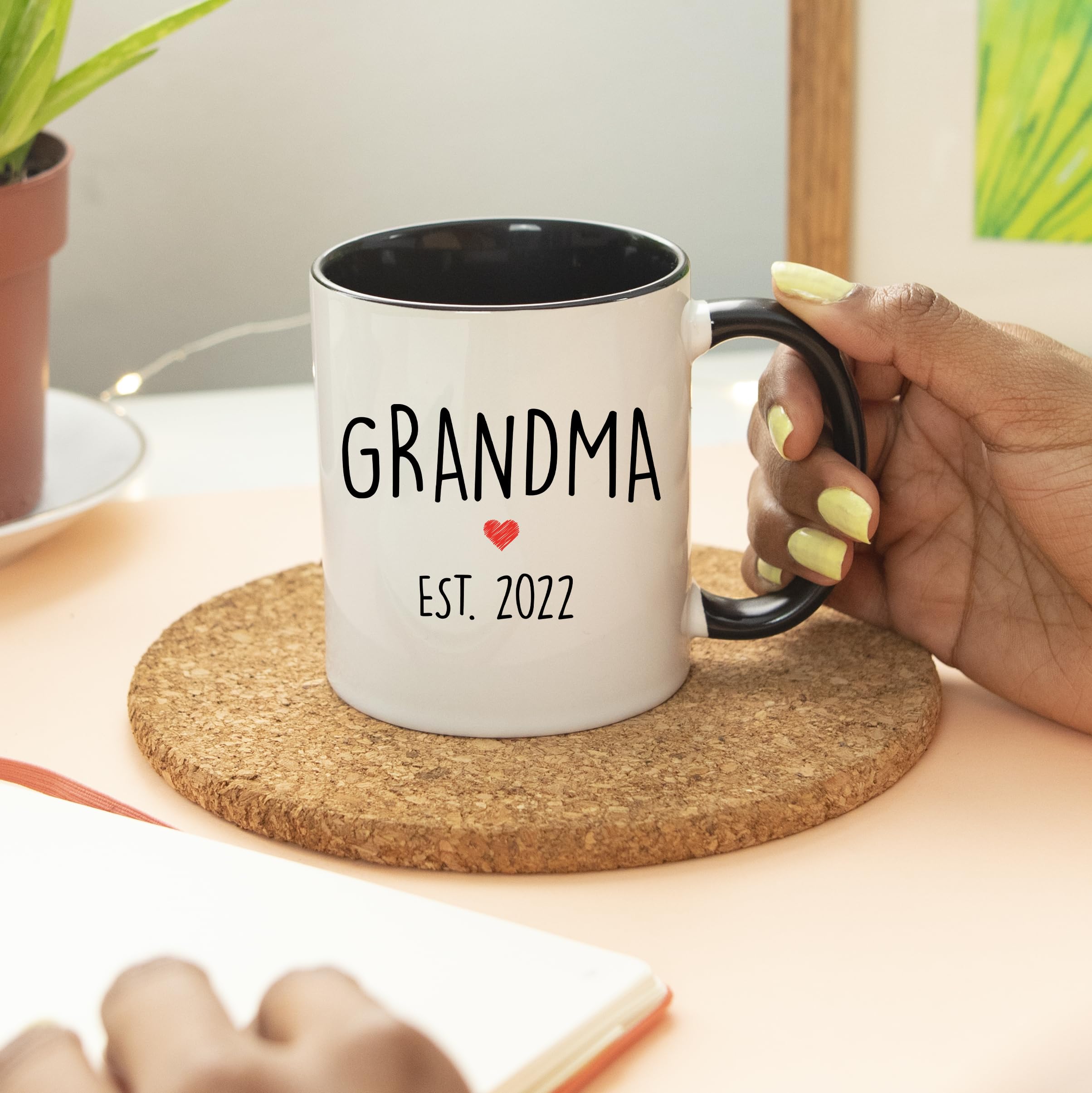 YouNique Designs 2022 Grandma Pregnancy Announcement Mug - 11oz Ceramic Cup for First-Time Grandparents, Baby Reveal Gift, Black Handle - Perfect for Grandparent's Day, Baby Showers & Special Celebrations