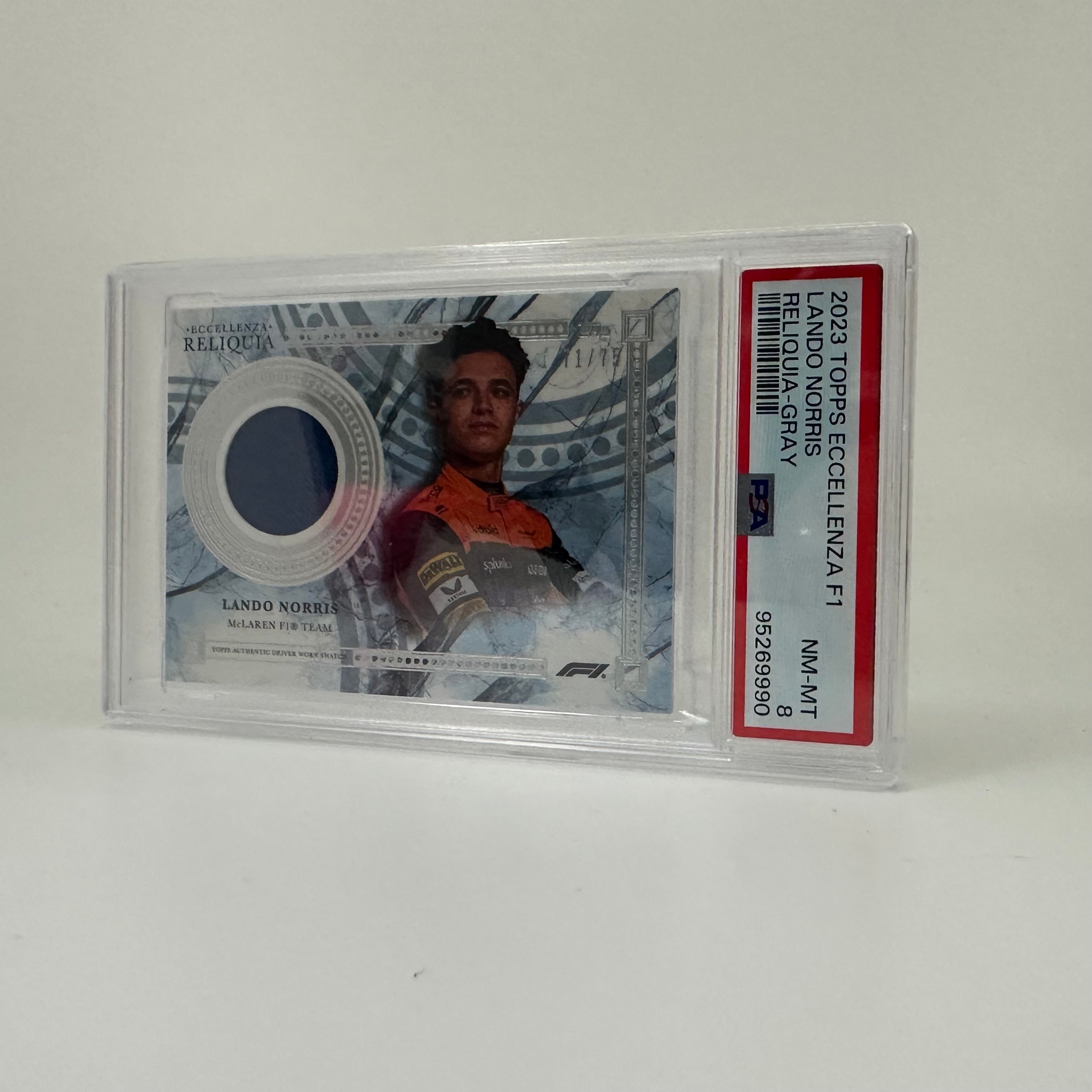 2023 Topps Eccellenza Lando Norris Gray Relic Card PSA 8 (71/75) - Perfect for F1 Collectors & Racing Memorabilia Displays