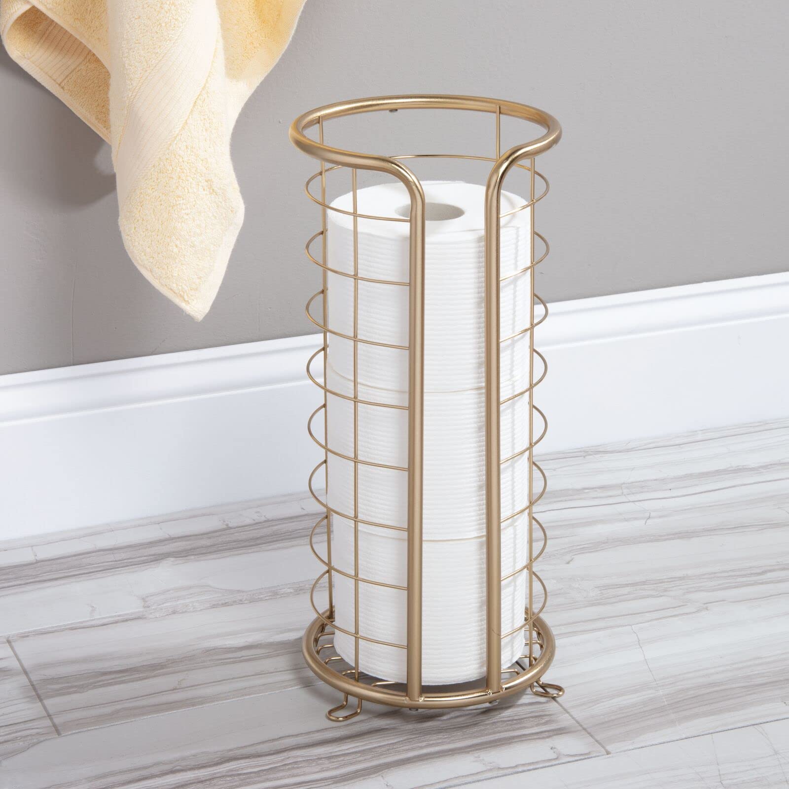 mDesign Metal Toilet Paper Holder Stand - Freestanding Bathroom Tissue Storage for 3 Rolls - Modern Floor Toilet Paper Dispenser - Omni Collection in Soft Brass - Perfect for Bathroom, Guest Room, and Office Use