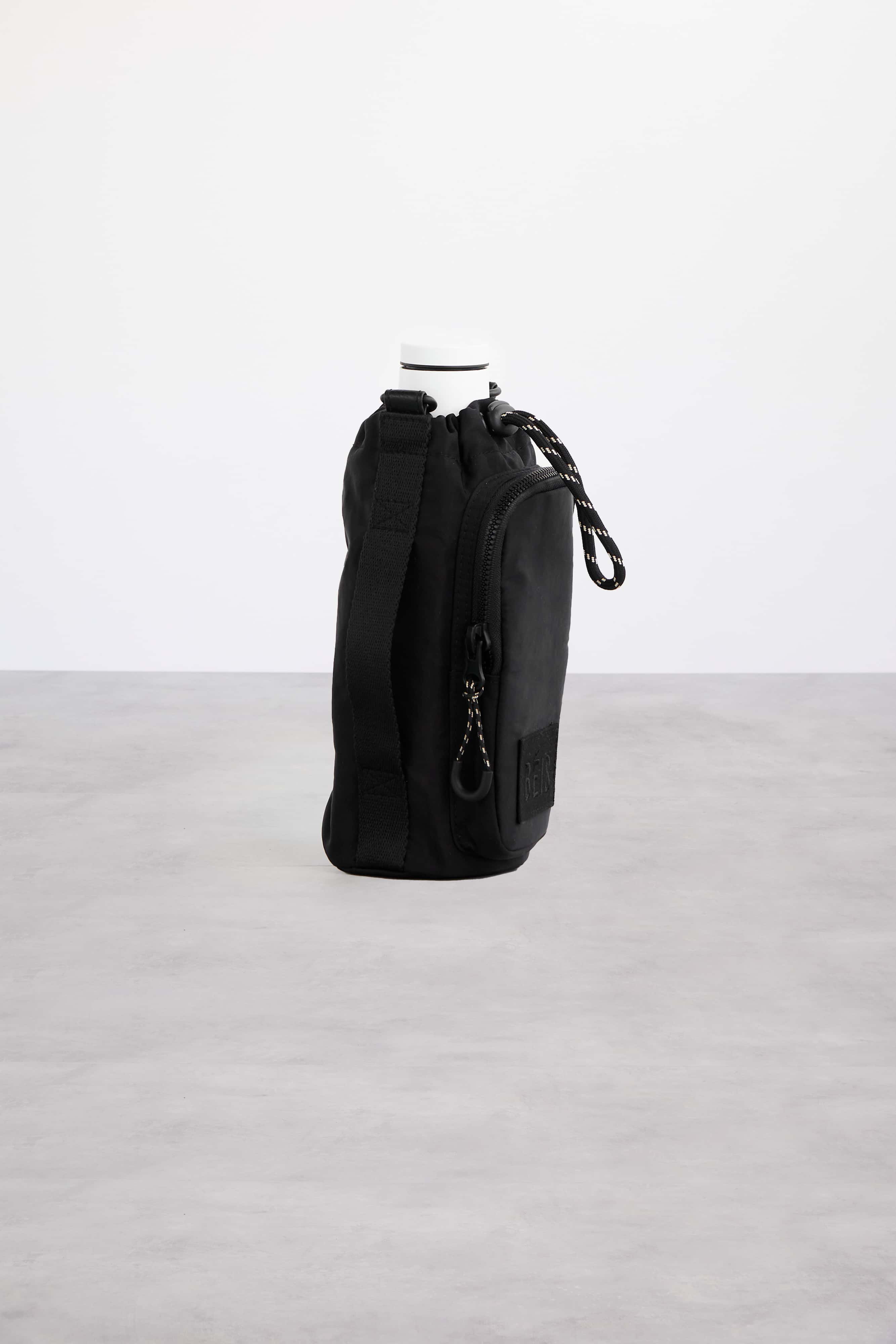 Premium Black Water Bottle Sling - Leak-Proof & Adjustable Strap for Hiking, Gym & Outdoor Activities | Hands-Free Hydration Solution