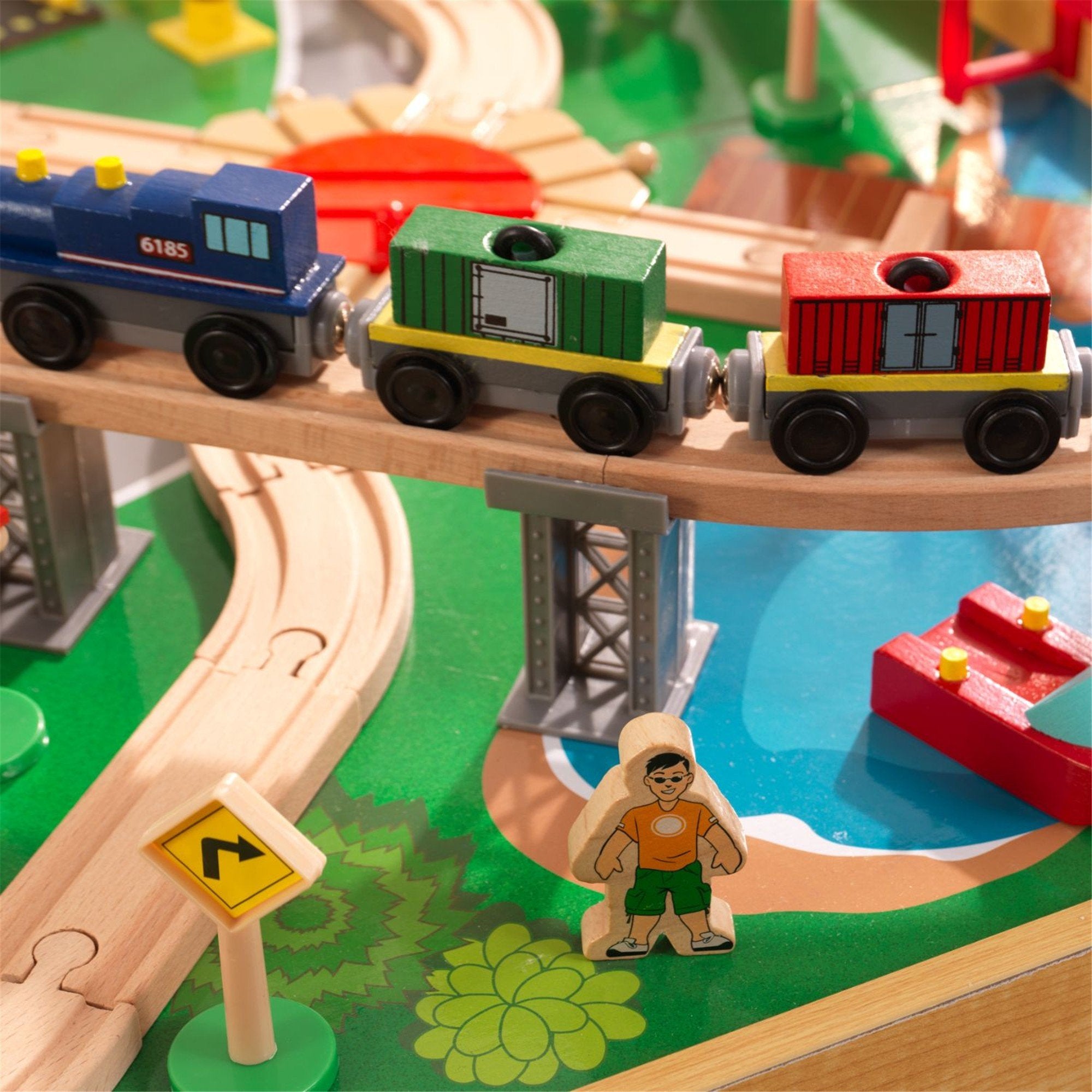 KidKraft Adventure Town Wooden Train Set with Table - 100+ Piece Wooden Railway Toy for Kids, Toddler Train Table Playset - Perfect for Pretend Play & Early Learning Development