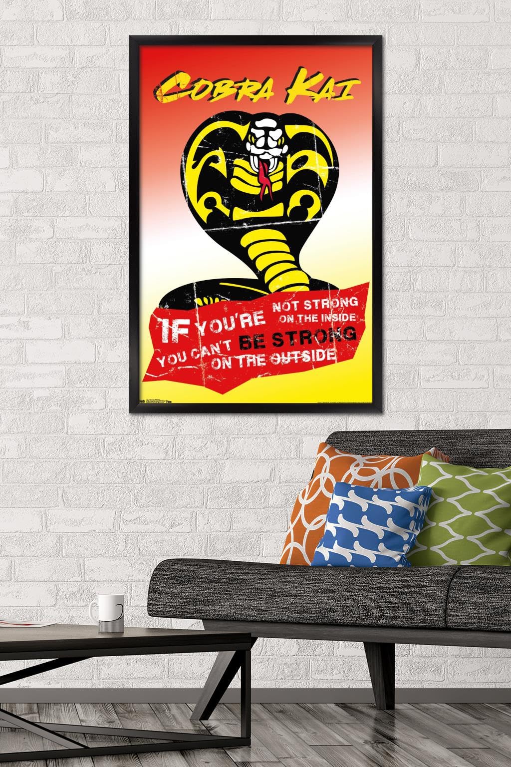 Cobra Kai Be Strong Motivational Wall Poster - 22.375 x 34 Inches Black Framed Art Print - Perfect for Home Gym, Office Decor & Martial Arts Dojo Inspiration