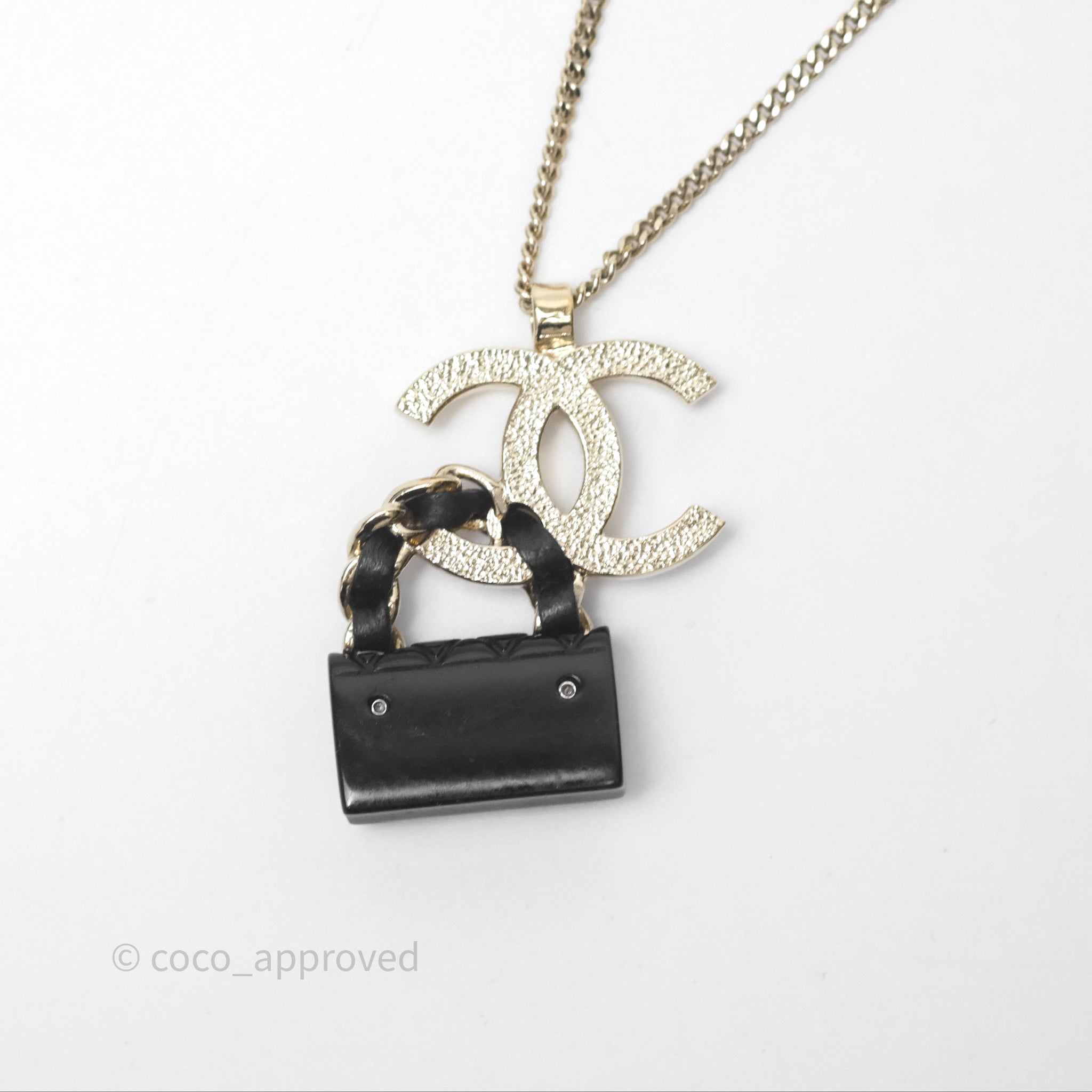 Chanel CC Black Flap Bag Pendant Necklace in Gold Tone - Elegant Jewelry for Women, Perfect Gift for Birthday, Anniversary & Special Occasions