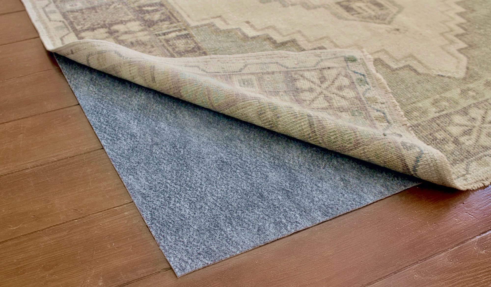 RUGPADUSA Non-Slip Rug Pad 6x9 Feet - Dual Surface Felt & Rubber - 1/10 Inch Thick Low Profile Rug Underlay - Made in USA for Living Room, Bedroom, Office Floor Protection