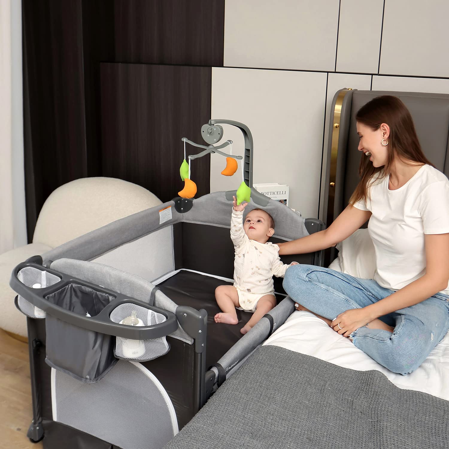 **Zdolmy 4-in-1 Baby Bedside Sleeper Bassinet & Play Yard – Adjustable Height, Diaper Changing Table, Storage Bag, Toy Arch & Music – Portable Crib for Newborns & Infants – Perfect for Nursery, Travel & Co-Sleeping**