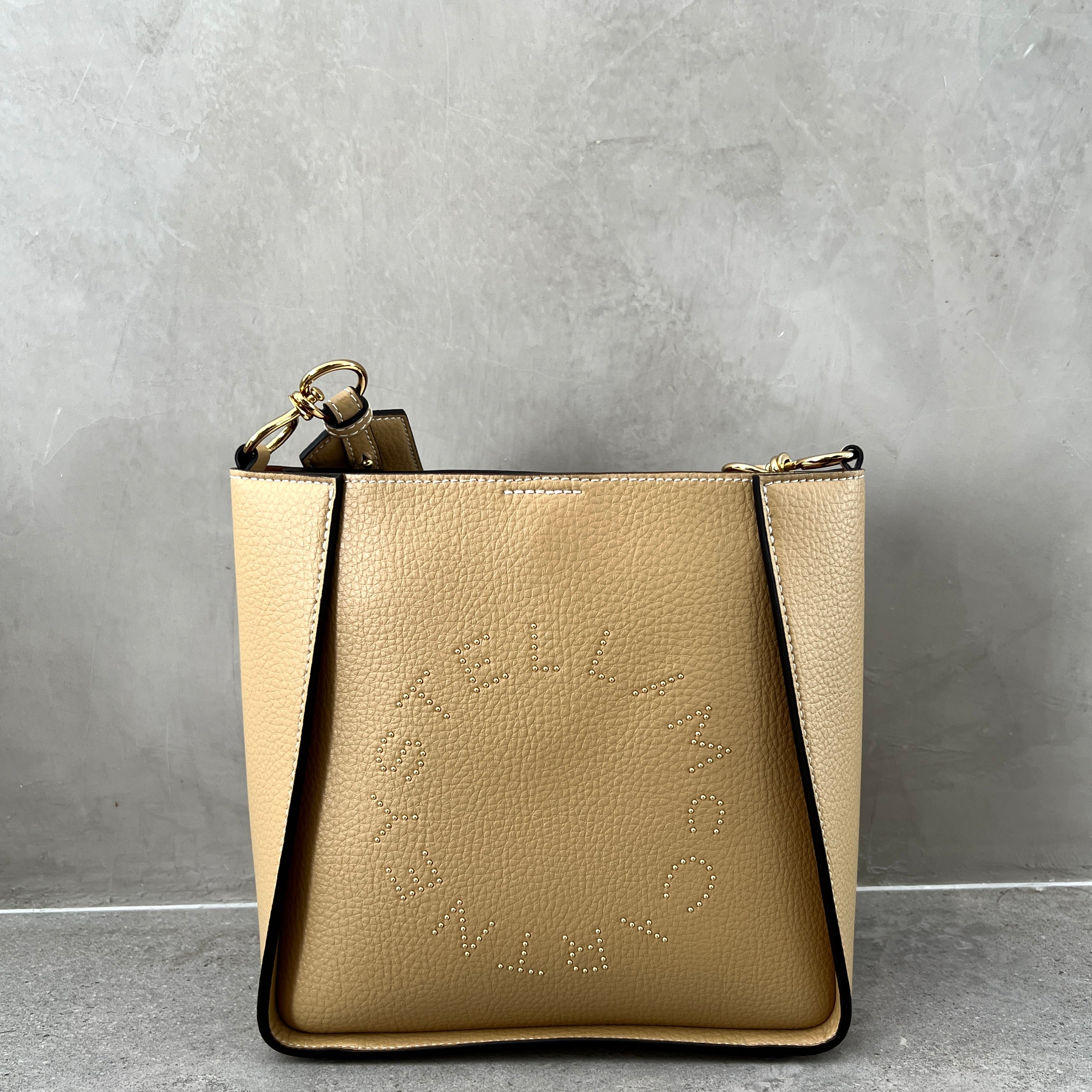 Stella Logo Mini Crossbody Hobo Bag with Grain Studs in Caramel - Stylish & Compact Purse for Women, Perfect for Everyday Use, Travel & Casual Outings