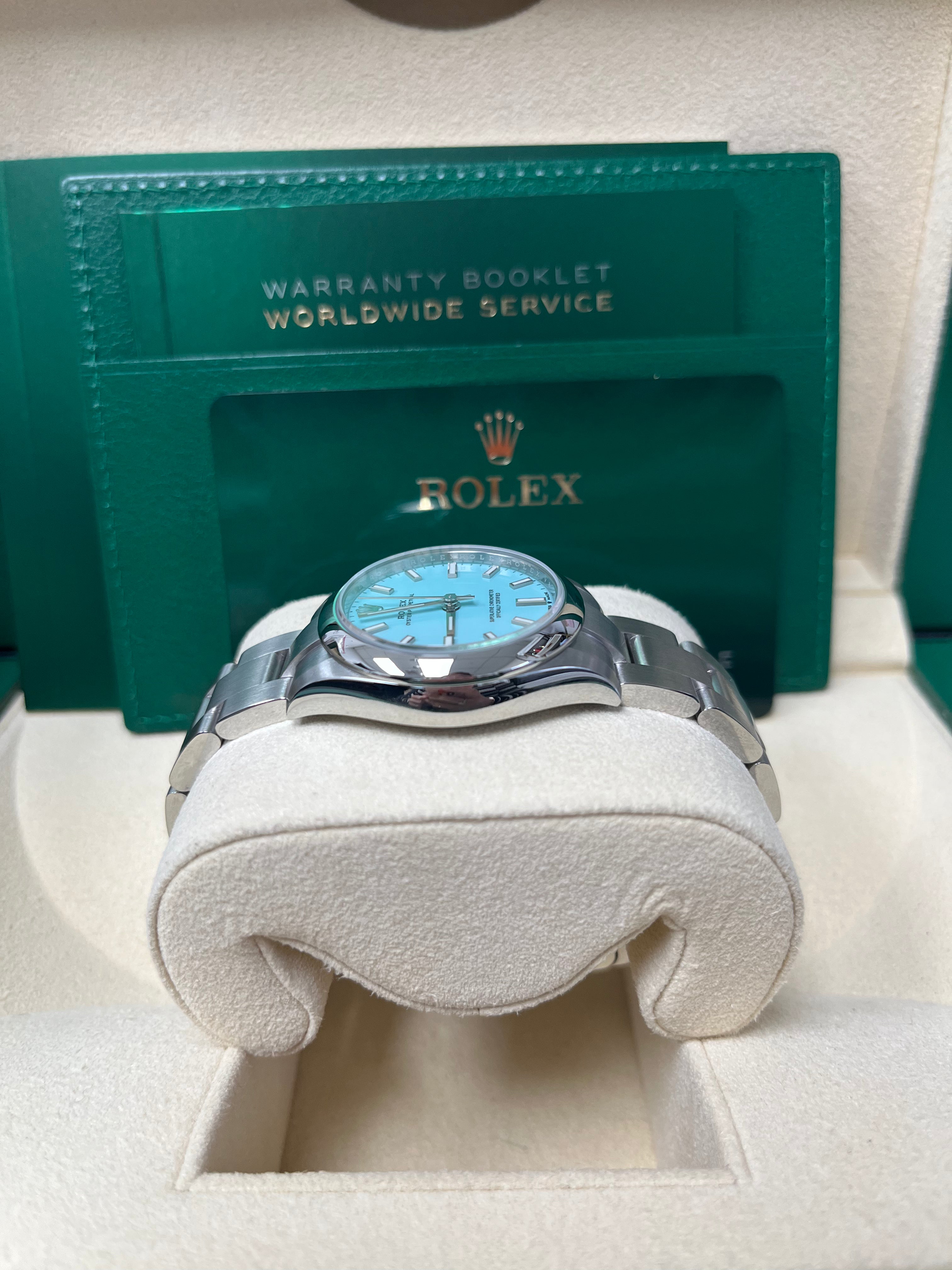 Rolex Oyster Perpetual 31mm Watch - Domed Bezel, Turquoise Blue Index Dial, Oyster Bracelet (Model 277200) | Luxury Women's Watch for Business, Parties & Special Occasions