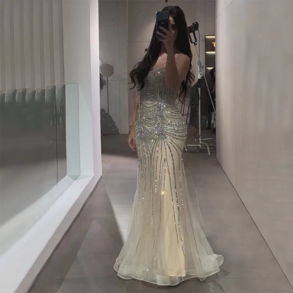 Elegant Silver Nude Spaghetti Strap Mermaid Evening Gown with Beaded Tassels - Dubai Luxury Formal Dress for Prom, Gala & Special Occasions - LA72772