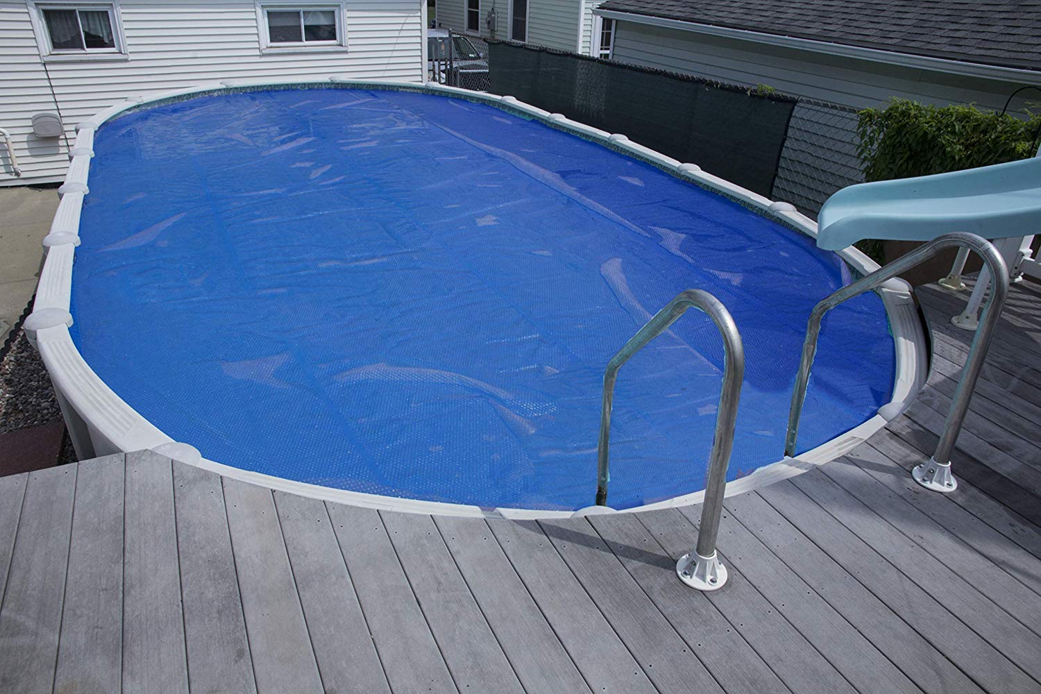 MidWest Canvas 12x18 Foot Oval Solar Pool Cover | 12 Mil Thick Heating Blanket for In-Ground & Above-Ground Pools | Bubble Side Down Installation | Energy Efficient Swimming Pool Accessory for Summer & Winter Use