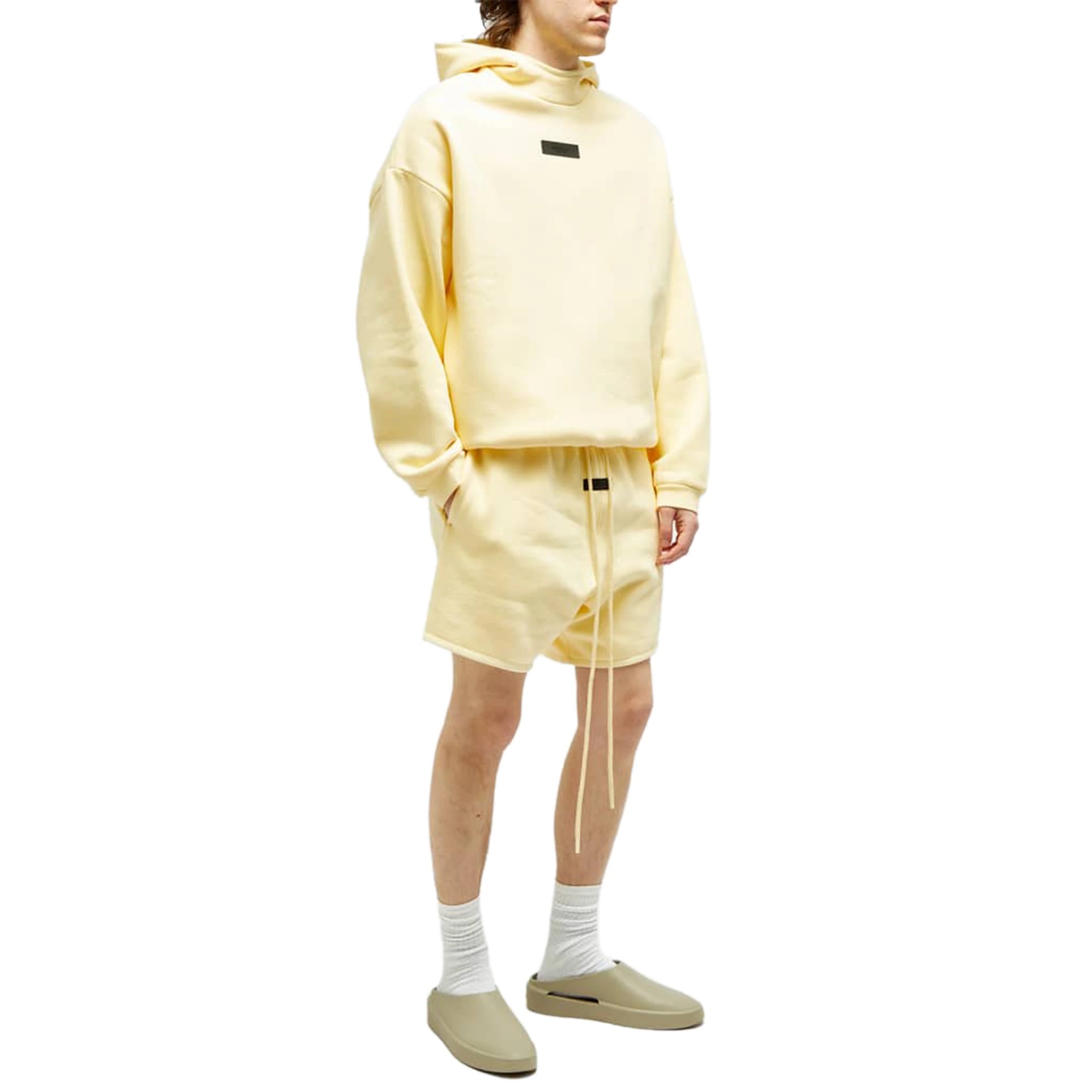 Fear of God Essentials FW23 Garden Yellow Shorts - Men's Casual Loungewear for Summer & Streetwear Outfits