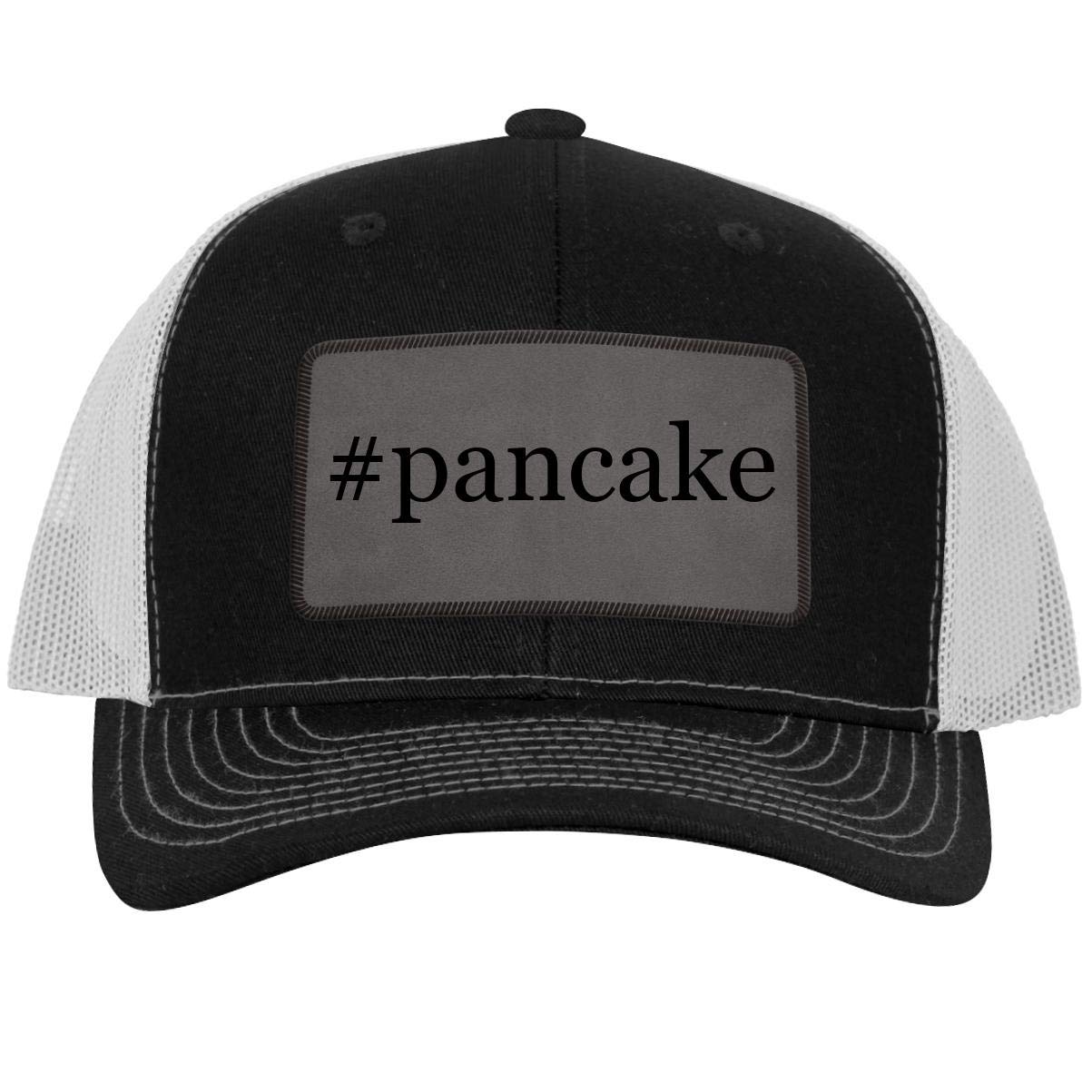 Leather Hashtag Grey Patch Engraved Trucker Hat - Trendy One Legging Design with Pancake Motif | Perfect for Streetwear, Music Festivals & Casual Outfits
