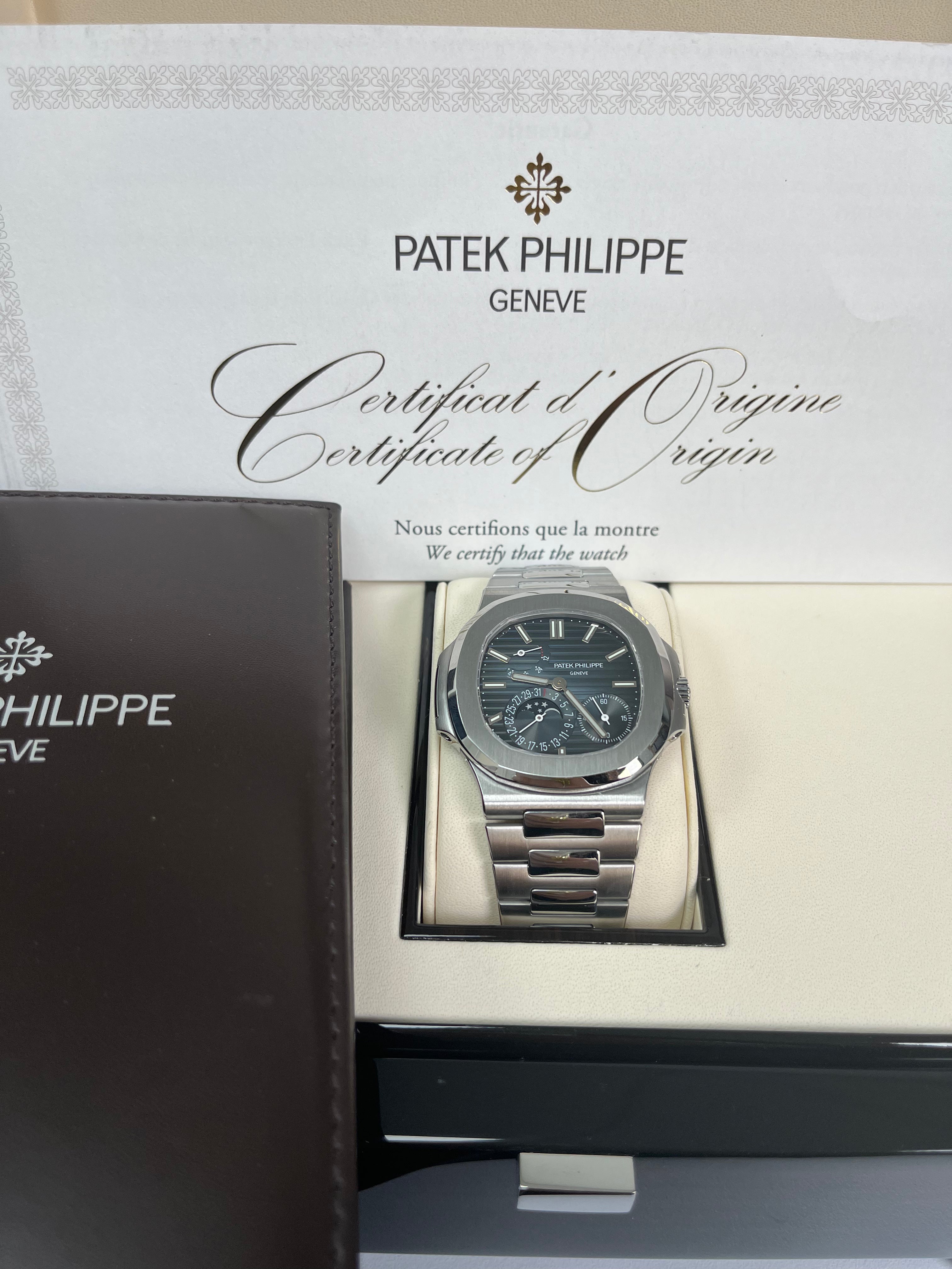 Patek Philippe Nautilus 5712/1A-001 Moon Phase Stainless Steel Watch with Blue Dial - Luxury Men's Timepiece for Business, Gala Events & Collector's Showcase