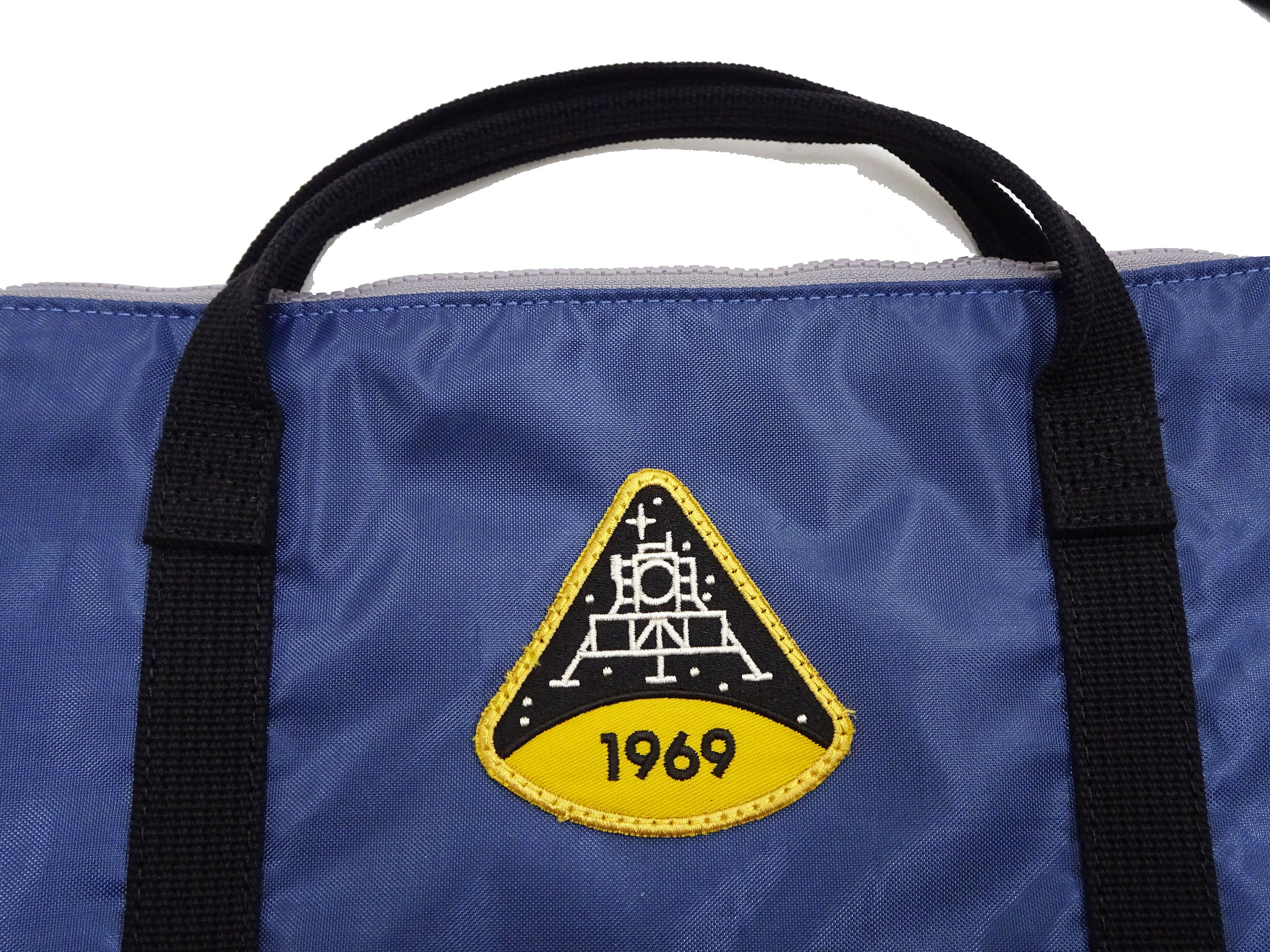 TOYS McCOY Men's Astronaut Snoopy Nylon Shoulder Bag - Vintage USAF Military Helmet Inspired Casual Messenger Bag TMA2411-121 in Dusty Blue - Perfect for Travel, Work & Everyday Use