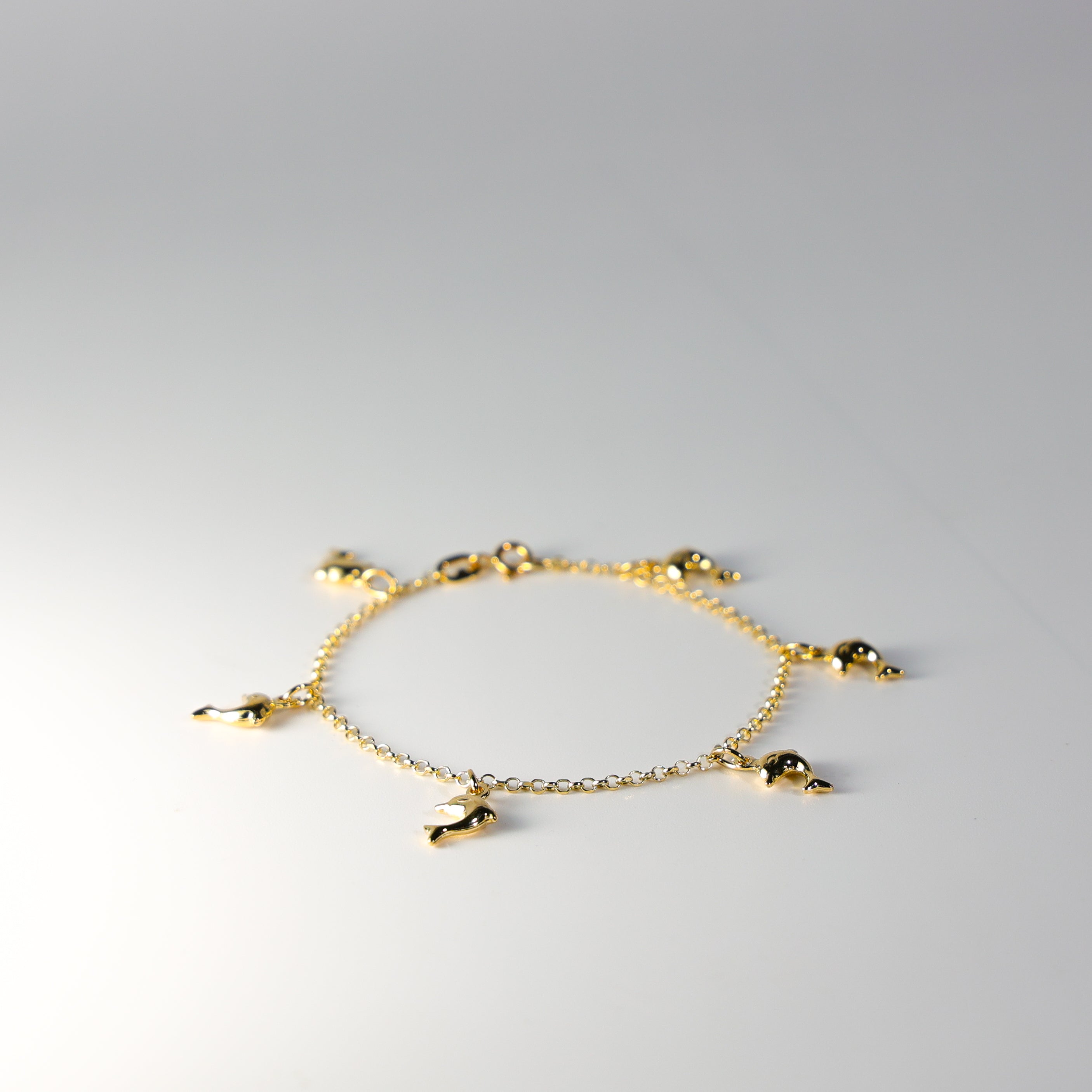 Gold Hanging Dolphins Bracelet AB0277 - Elegant Jewelry Gift for Women, Perfect for Parties, Weddings & Everyday Wear