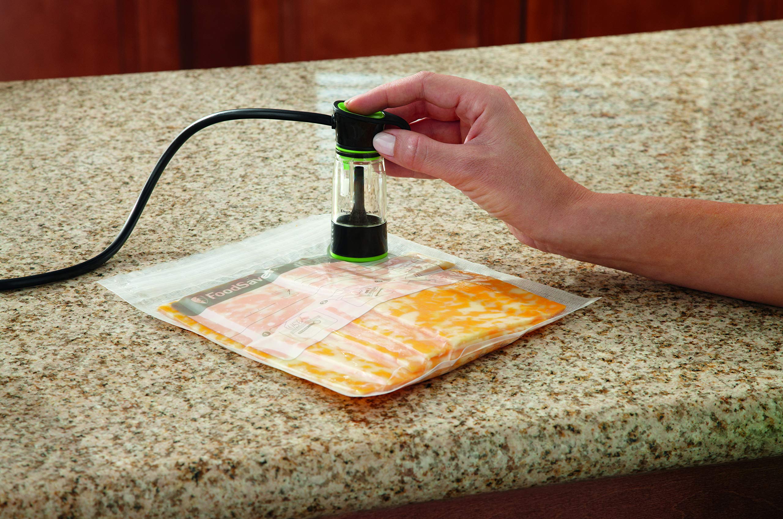 **FoodSaver Compact Vacuum Sealer Machine with BPA-Free Bags & Rolls – Airtight Food Storage, Sous Vide, Meal Prep – Includes 18 Count 1-Quart Multilayer Vacuum Zipper Bags (White)**    Perfect for preserving leftovers, sous vide cooking, and extending food freshness for home kitchens, camping, or bulk shopping.
