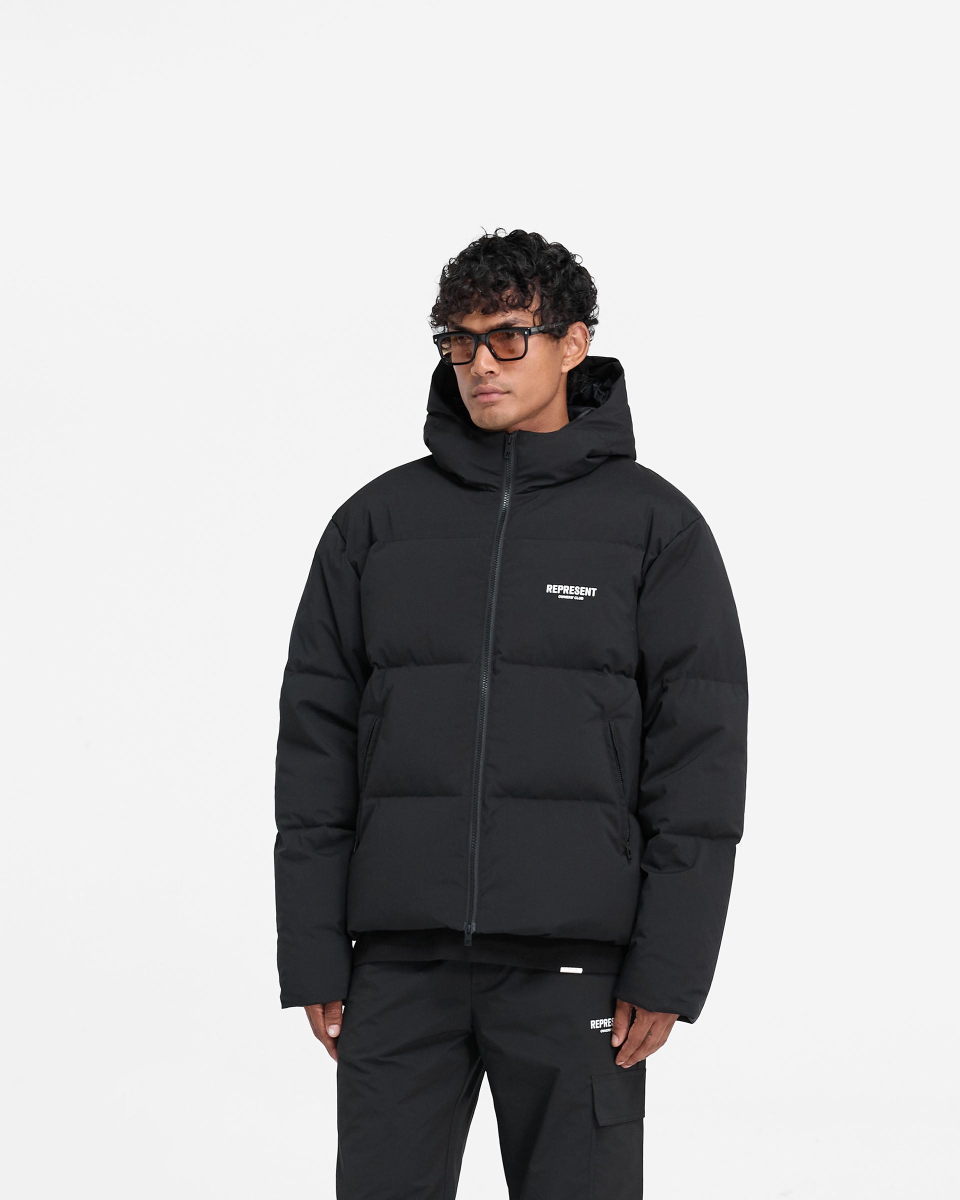 Represent Owners Club Hooded Puffer Jacket - Black | Winter Warm Fashion Coat for Men & Women | Perfect for Streetwear, Urban Outfits & Cold Weather