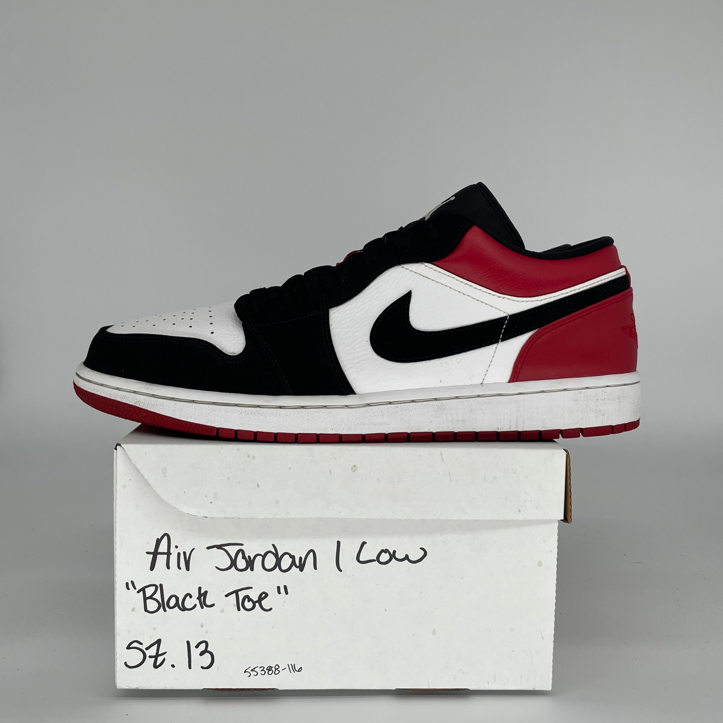 Original Title: AIR JORDAN 1 LOW BLACK TOE SIZE 13 553558 116   Optimized Title: **Air Jordan 1 Low Black Toe Men's Sneakers - Size 13 (553558-116) - Retro Basketball Shoes for Casual Wear & Street Style**    (Note: The optimized title improves SEO by including relevant keywords like 