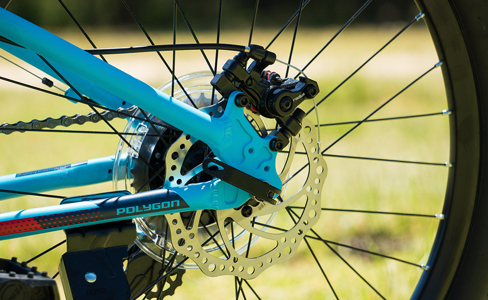 Polygon Relic 24 Kids Mountain Bike - 24 Inch Wheels, Lightweight Aluminum Frame, 7-Speed Gears - Perfect for Trail Riding, Backyard Adventures & Learning to Ride
