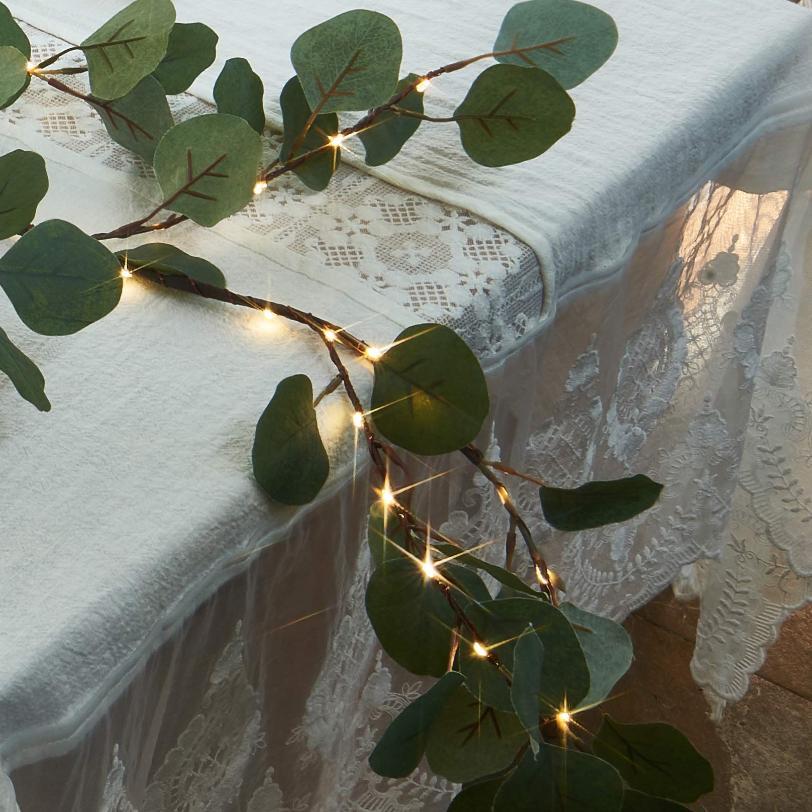 BAOLITVINE 6FT LED Eucalyptus Garland with 96 Fairy Lights - Battery Operated with Timer, Faux Greenery Vine Decor for Fireplace, Wall, Christmas, Wedding (Perfect for Indoor/Outdoor Holiday & Party Decorations)