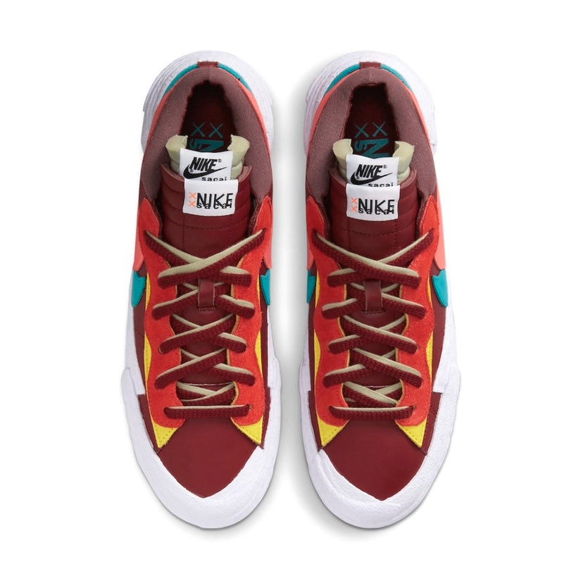 KAWS x Nike x Sacai Blazer Low Sneakers - Team Red/Hot Lava/White Colorway - Limited Edition Collaboration Shoes for Streetwear & Sneaker Collectors