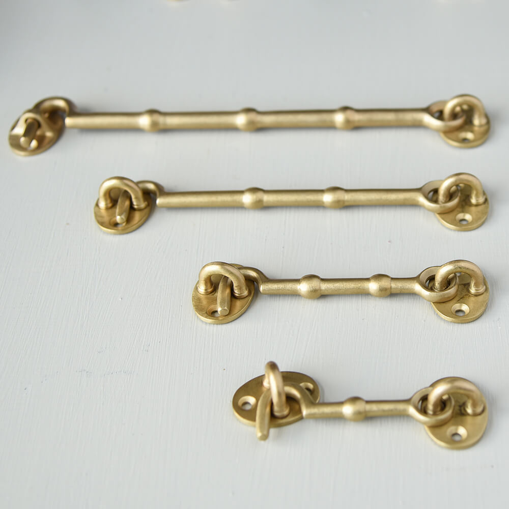 Vintage Aged Brass Cabin Hook - Heavy Duty Door Holder for Rustic Home Decor, Farmhouse, and Cabin Use - Perfect for Bedrooms, Bathrooms, and Closets