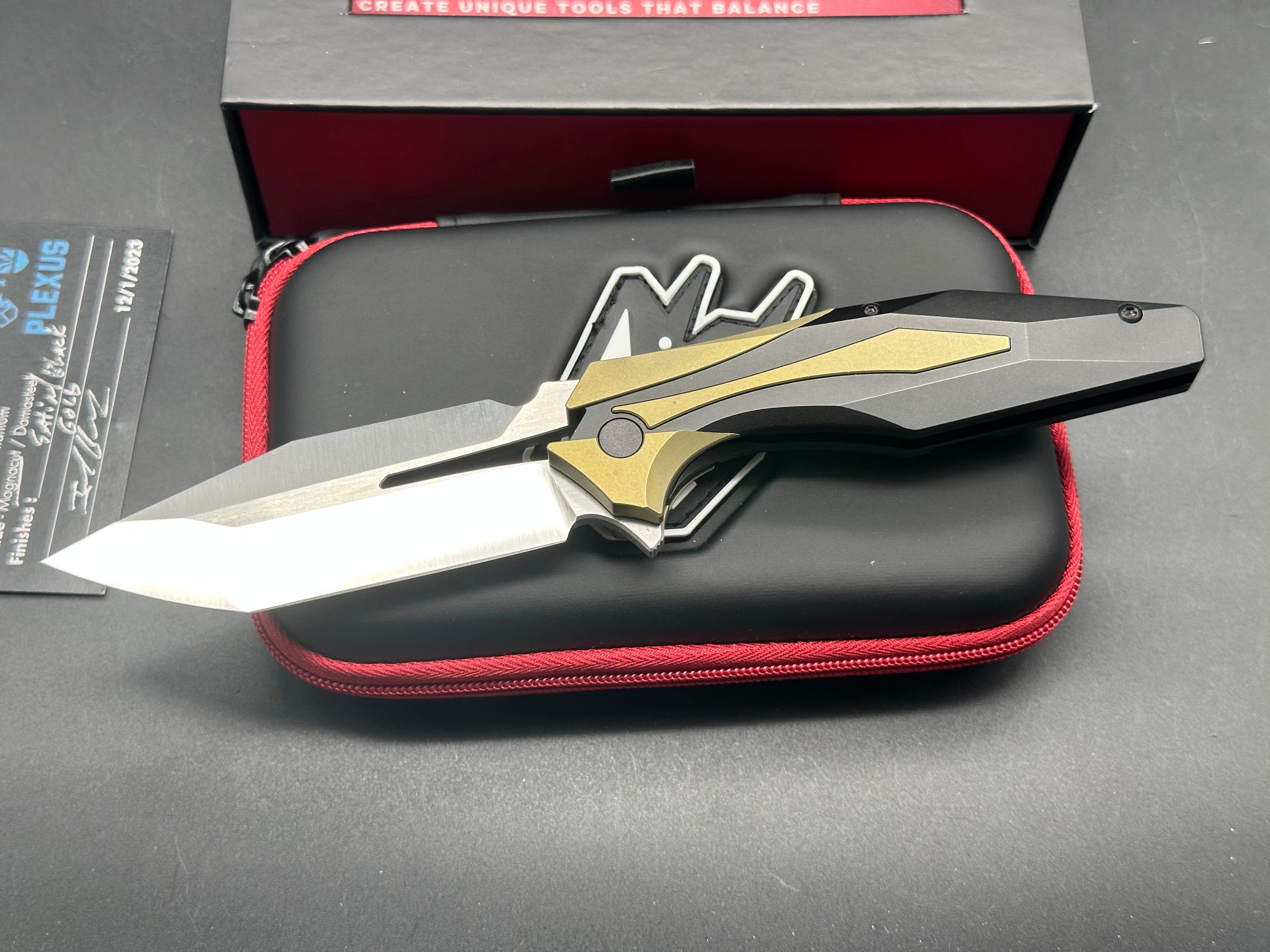 Arcane Design Plexus Black DLC Titanium Frame Knife with Gold Titanium Bolster Inlays - Modified Tanto Blade in M390 Steel - EDC, Outdoor, Tactical, and Collection Use