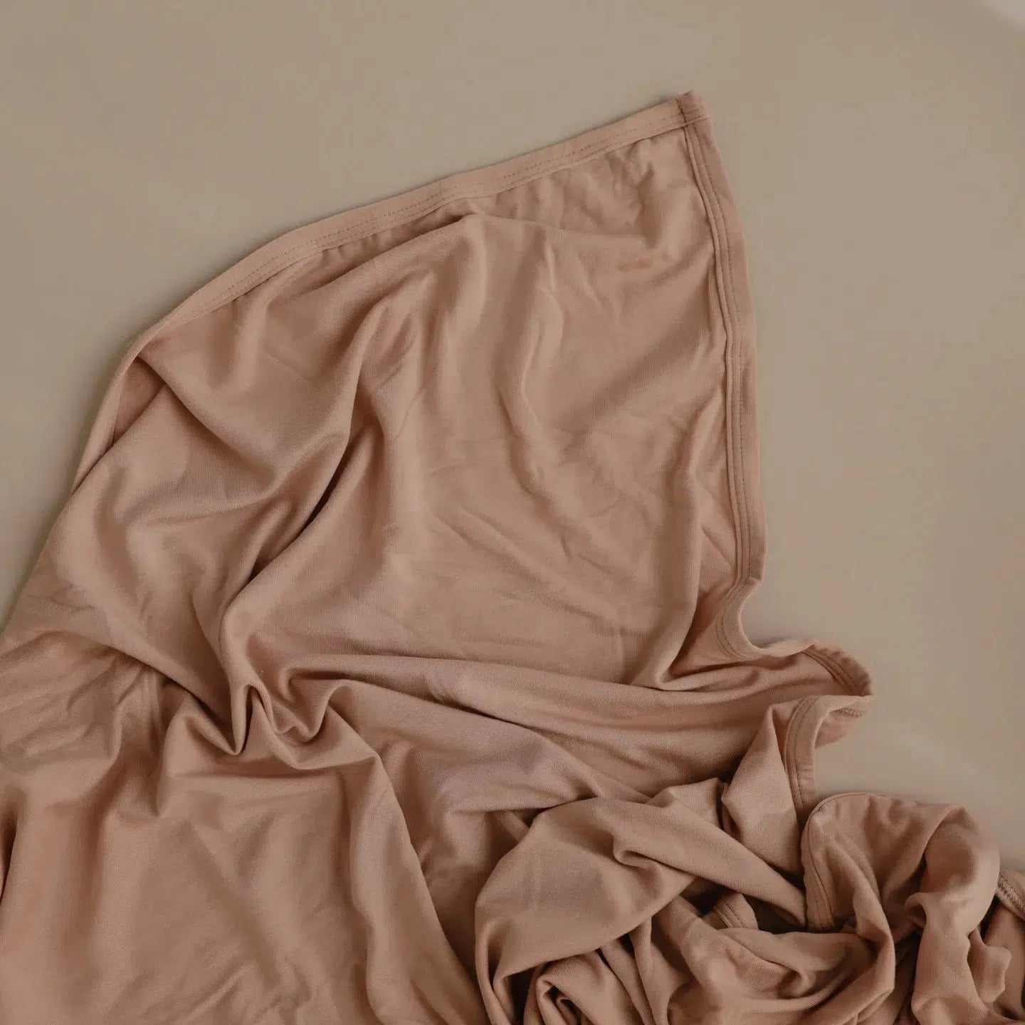 Mushie Stretchy Swaddle Blanket - Soft Baby Swaddle Wrap for Newborns, Breathable & Cozy Infant Blanket in Blush Pink - Perfect for Sleeping, Swaddling & Snuggling